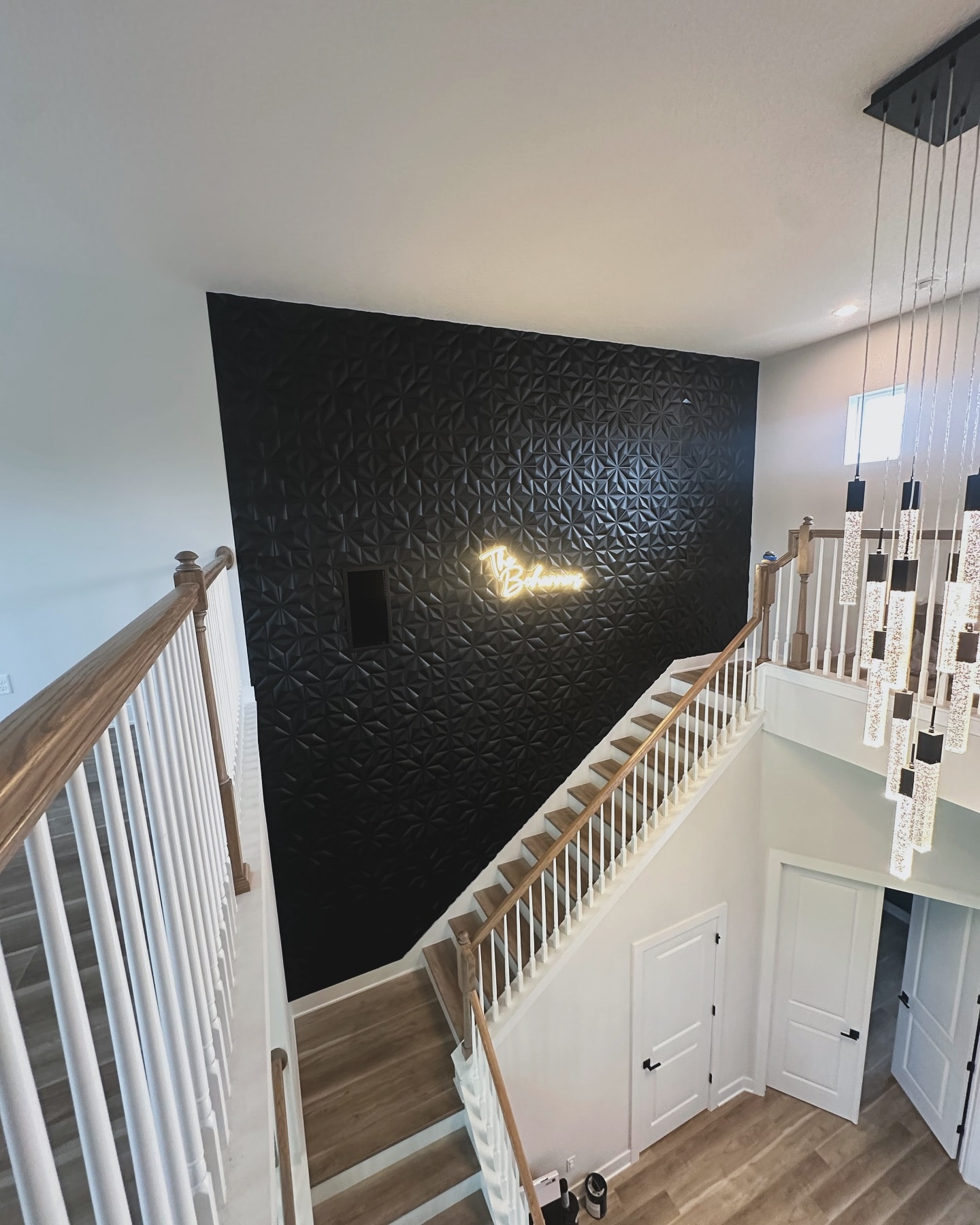 Board and batten accent wall, custom-built for the space, by AVP Construction JAX in Jacksonville & St. Johns County, FL