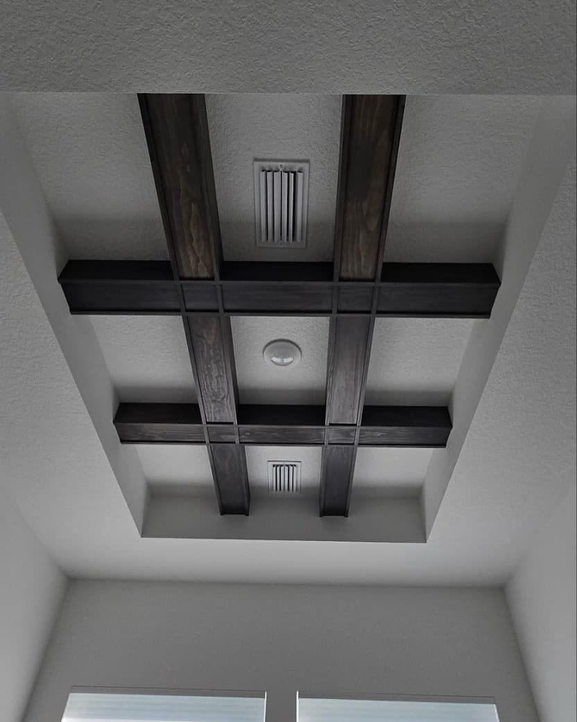 Coffered box-beam ceiling grid in dark stained wood by AVP Construction JAX