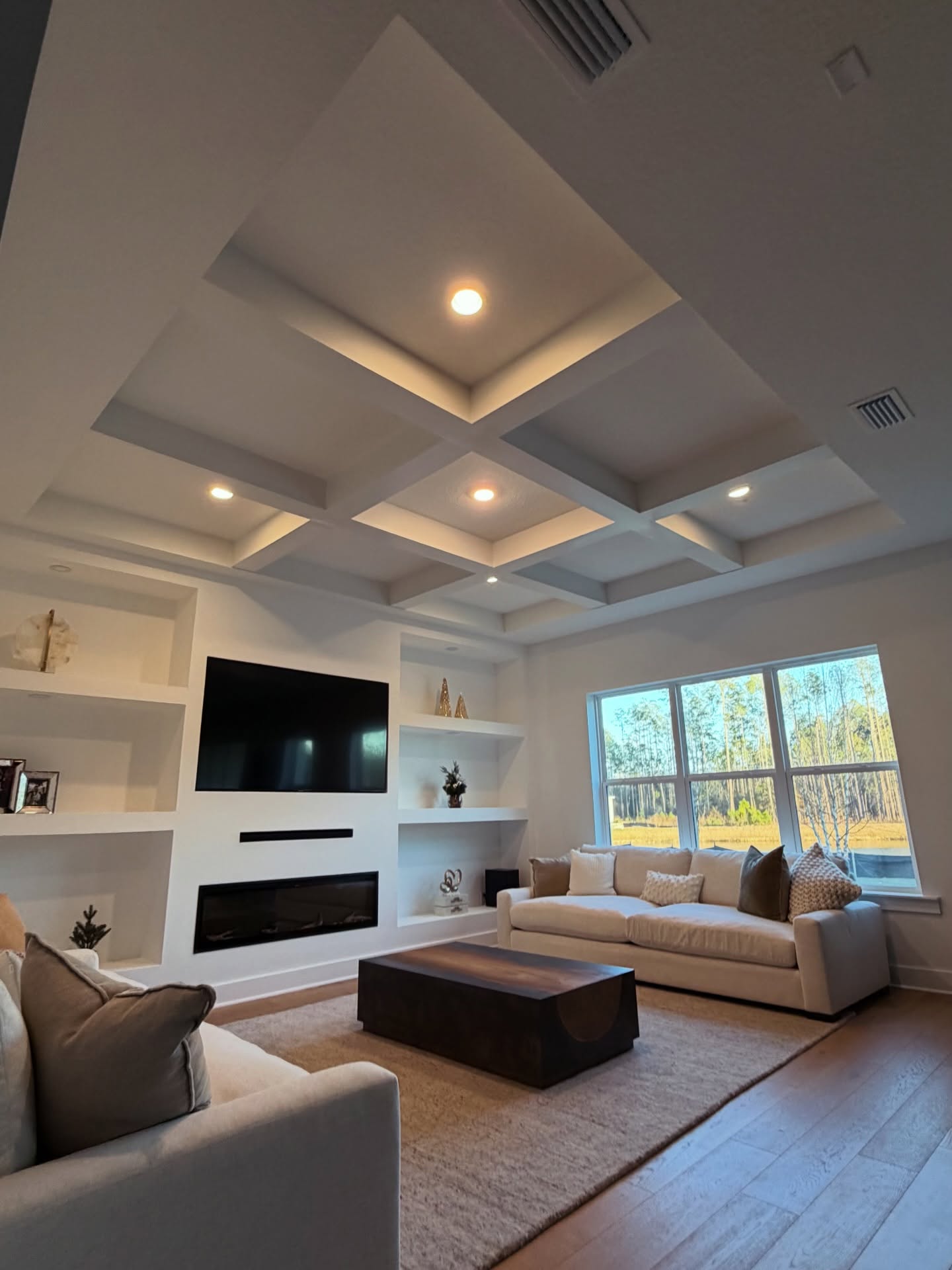 Painted coffered ceiling in living room, custom-built for the space, by AVP Construction JAX in Jacksonville & St. Johns County, FL