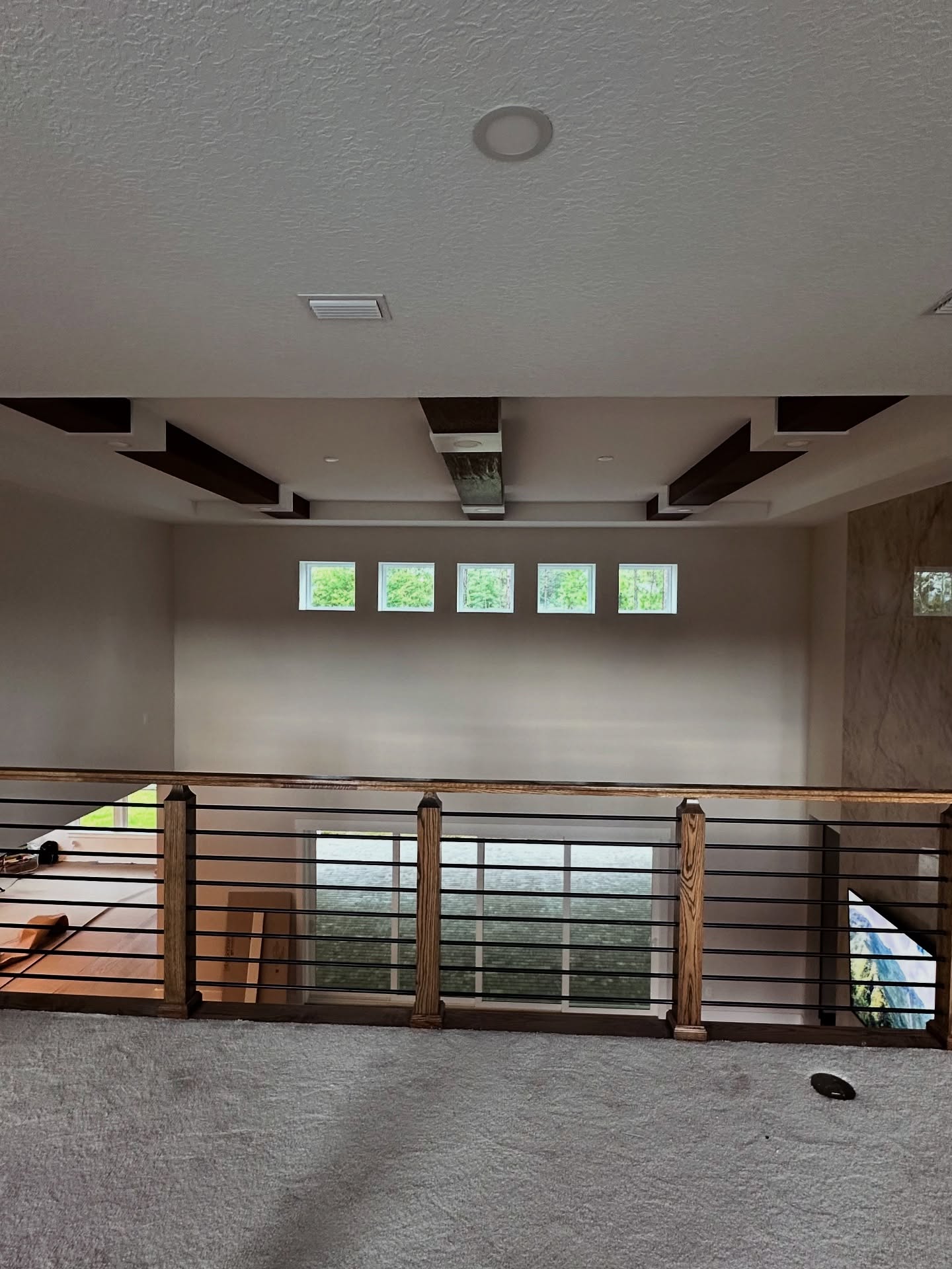 Cathedral ceiling with exposed beams, custom-built for the space, by AVP Construction JAX in Jacksonville & St. Johns County, FL