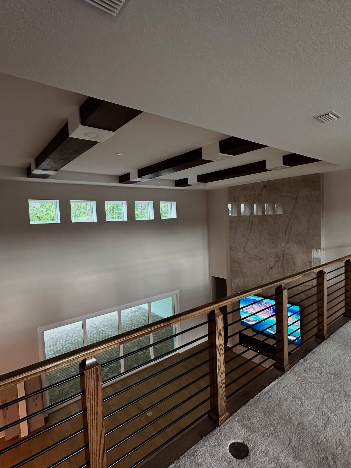 Coffered ceiling with crown molding, custom-built for the space, by AVP Construction JAX in Jacksonville & St. Johns County, FL