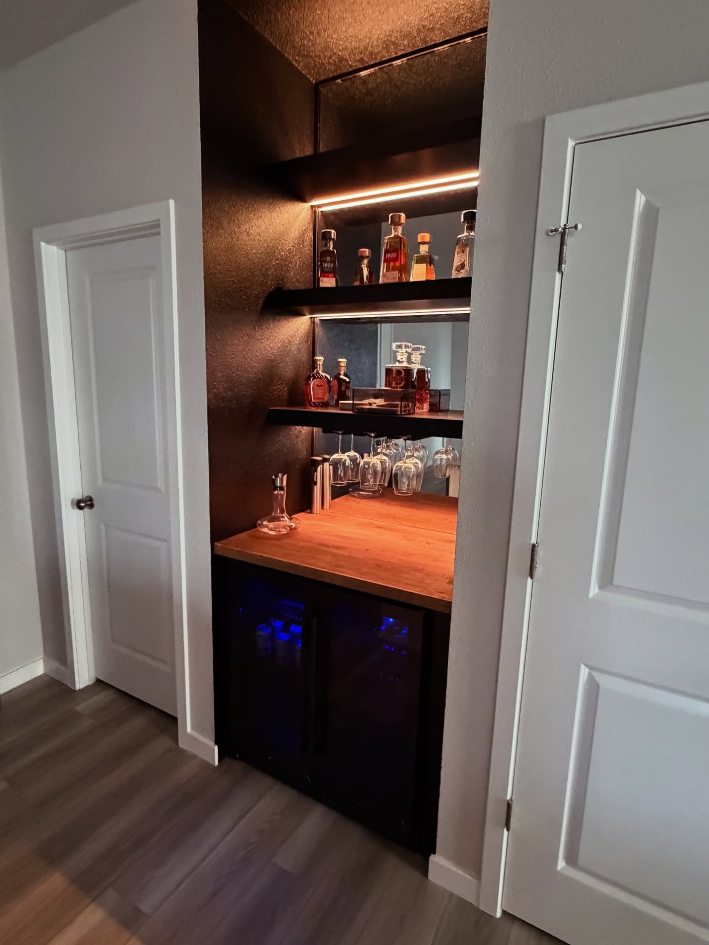 Built-in home dry bar with cabinet storage, custom-built for the space, by AVP Construction JAX in Jacksonville & St. Johns County, FL