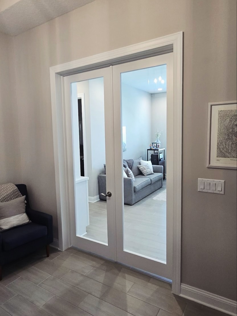 Custom interior French doors, custom-built for the space, by AVP Construction JAX in Jacksonville & St. Johns County, FL