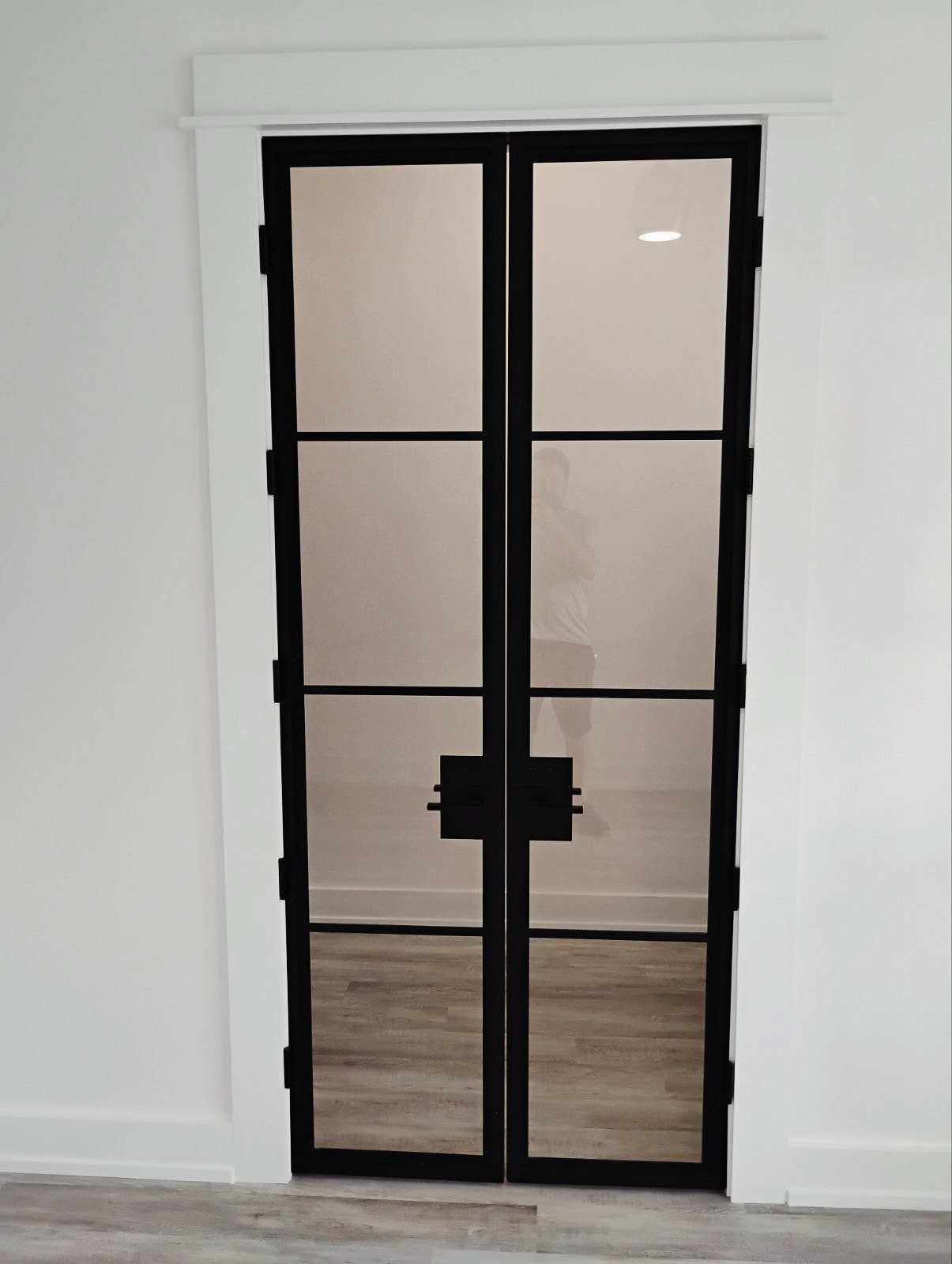 Glass French door installation, custom-built for the space, by AVP Construction JAX in Jacksonville & St. Johns County, FL