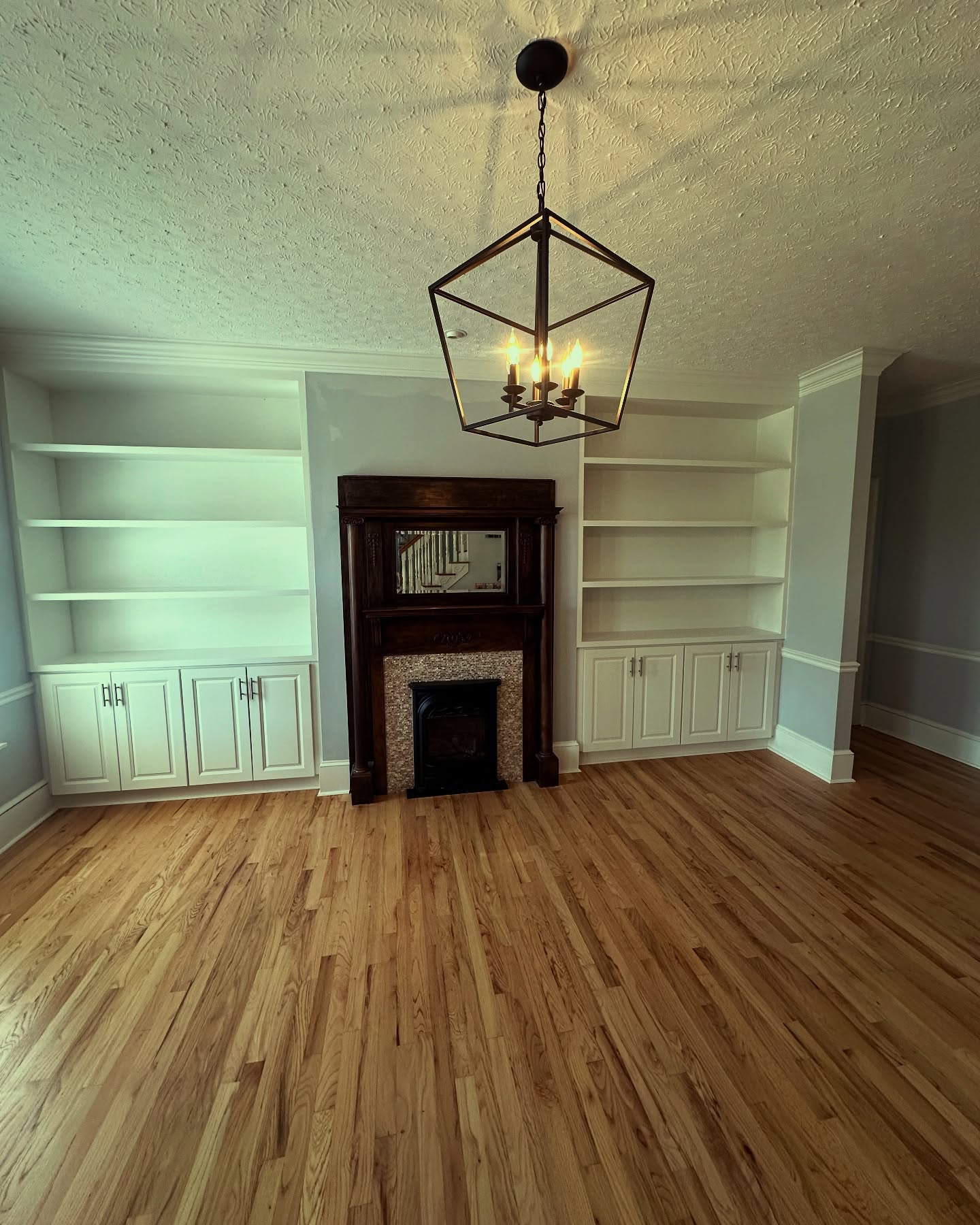 Custom home office built-in desk and shelving, custom-built for the space, by AVP Construction JAX in Jacksonville & St. Johns County, FL