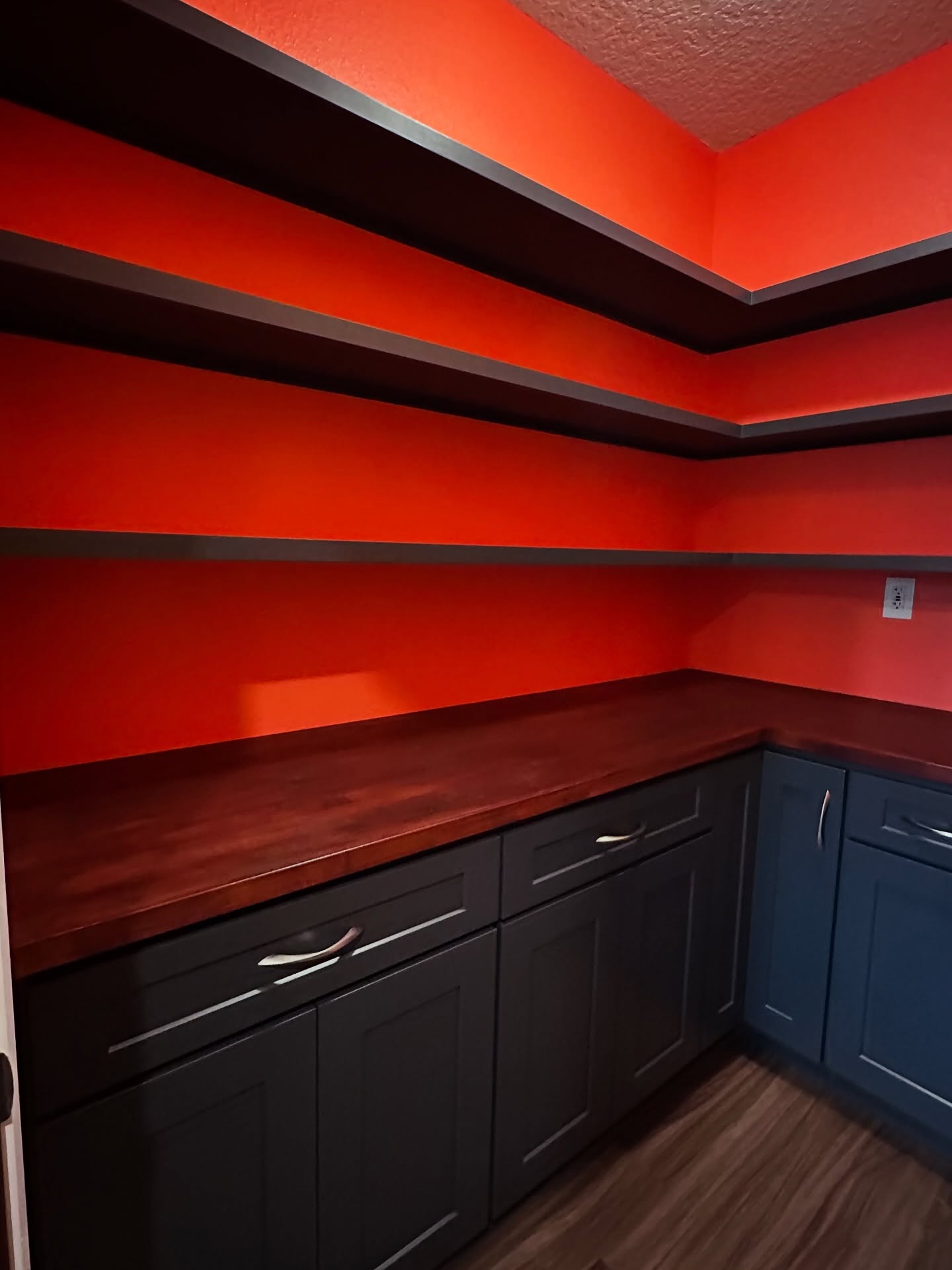 Pantry with floor-to-ceiling shelving, custom-built for the space, by AVP Construction JAX in Jacksonville & St. Johns County, FL