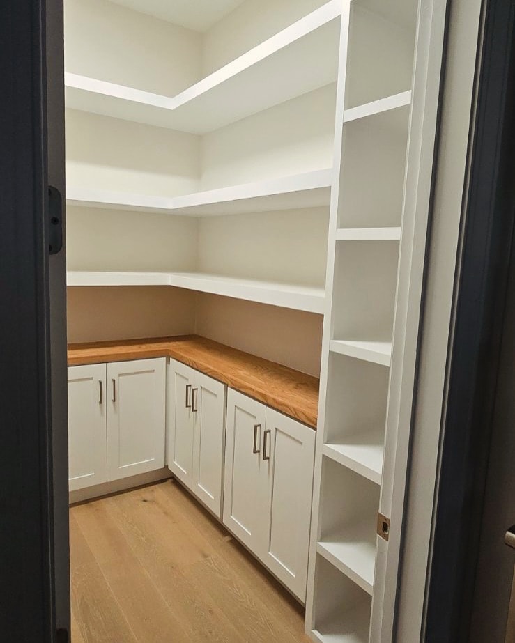 Butler's pantry with cabinets and counter, custom-built for the space, by AVP Construction JAX in Jacksonville & St. Johns County, FL