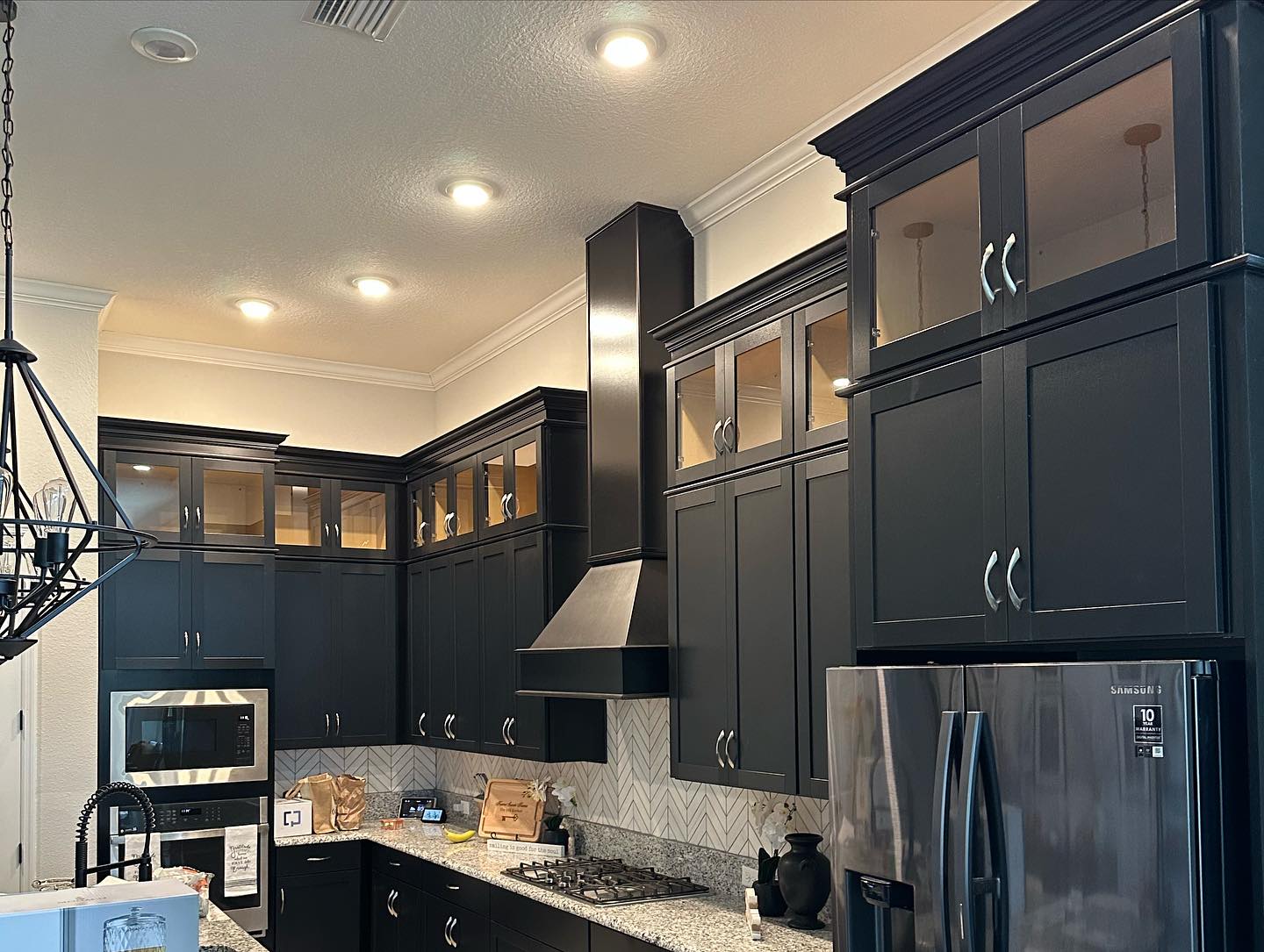 Custom plaster range hood, custom-built for the space, by AVP Construction JAX in Jacksonville & St. Johns County, FL