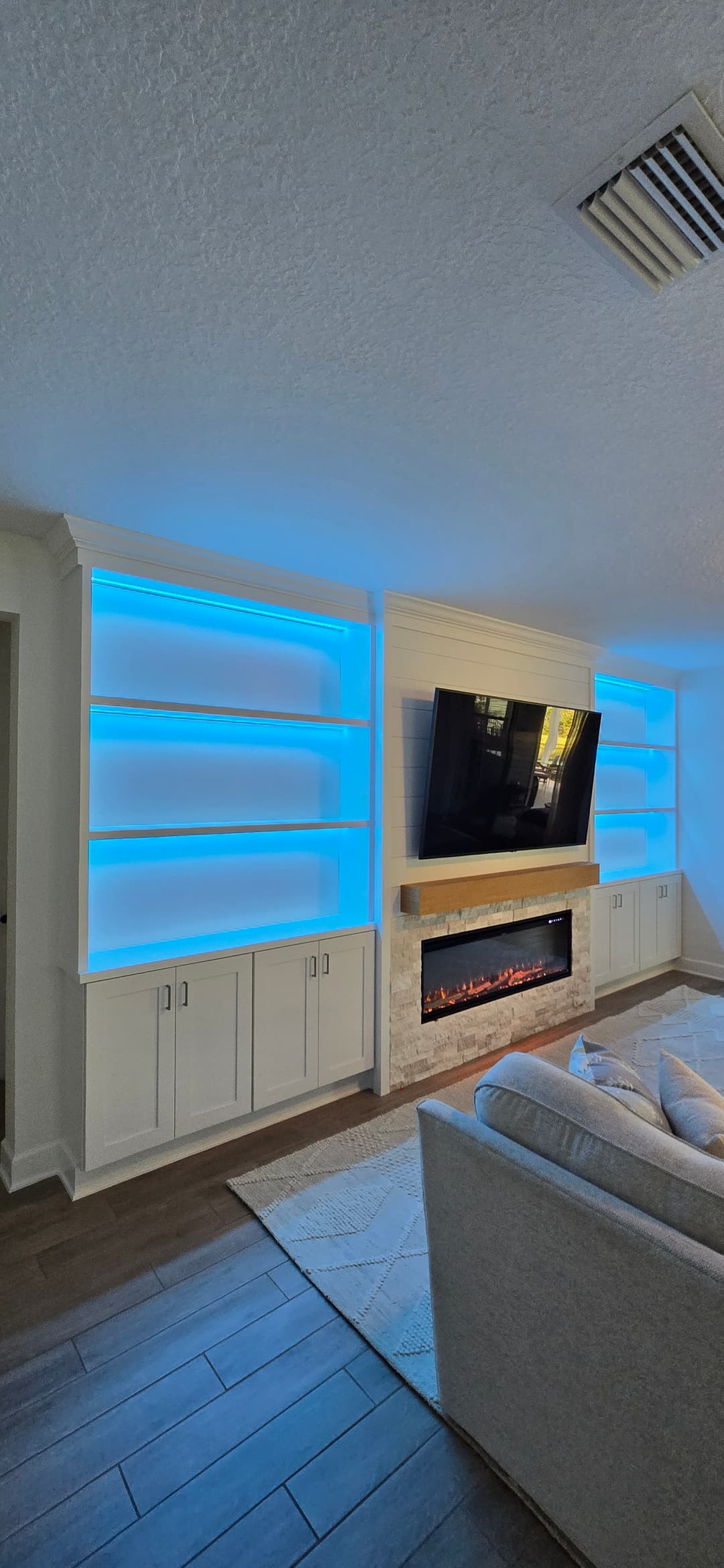 After: TV Entertainment Centers by AVP Construction JAX in Shearwater, Jacksonville, FL