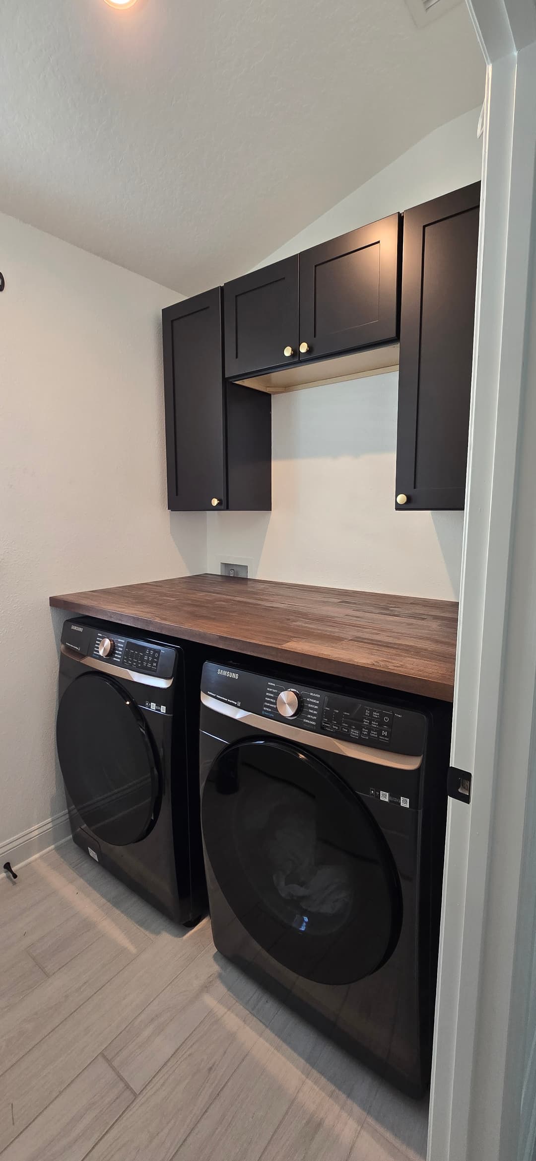 After: Laundry room butcher block by AVP Construction JAX in Southside, Jacksonville, FL