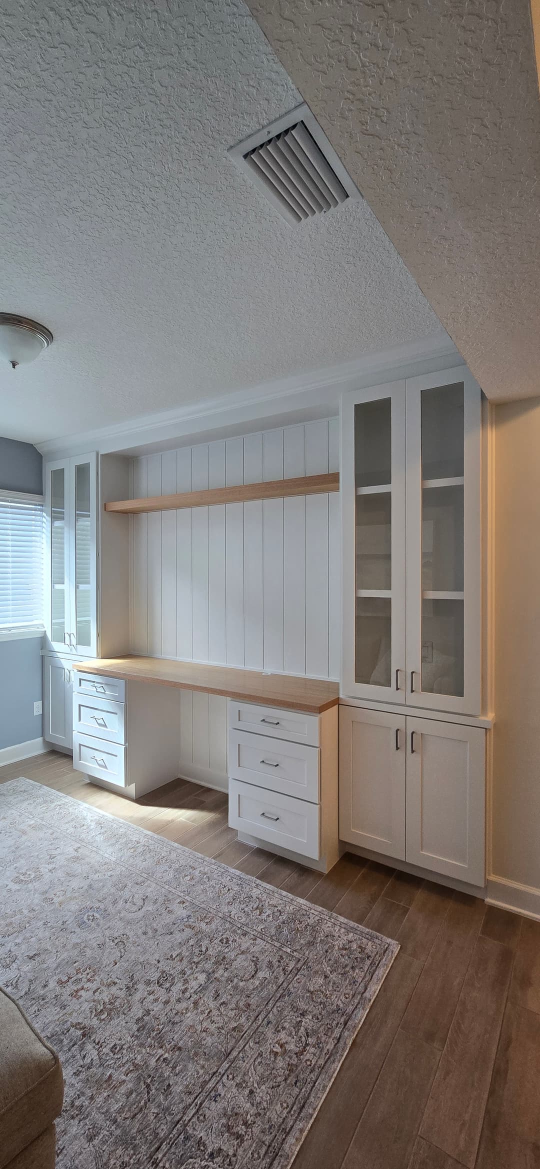 After: TV Entertainment Centers by AVP Construction JAX in Shearwater, St. Johns, FL