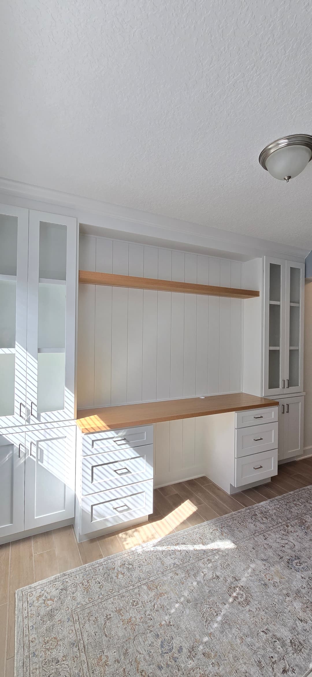 After: TV Entertainment Centers by AVP Construction JAX in Shearwater, St. Johns, FL