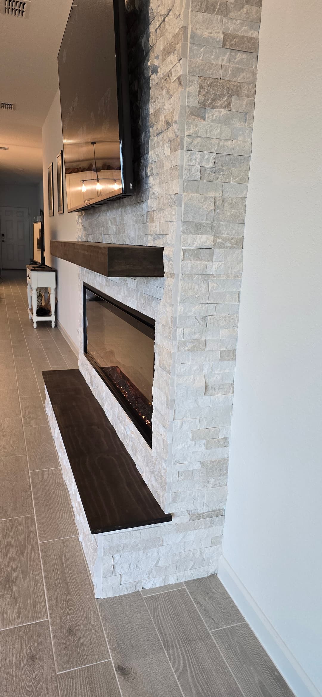 After: TV Entertainment Centers by AVP Construction JAX in Trailmark, St. Johns, FL