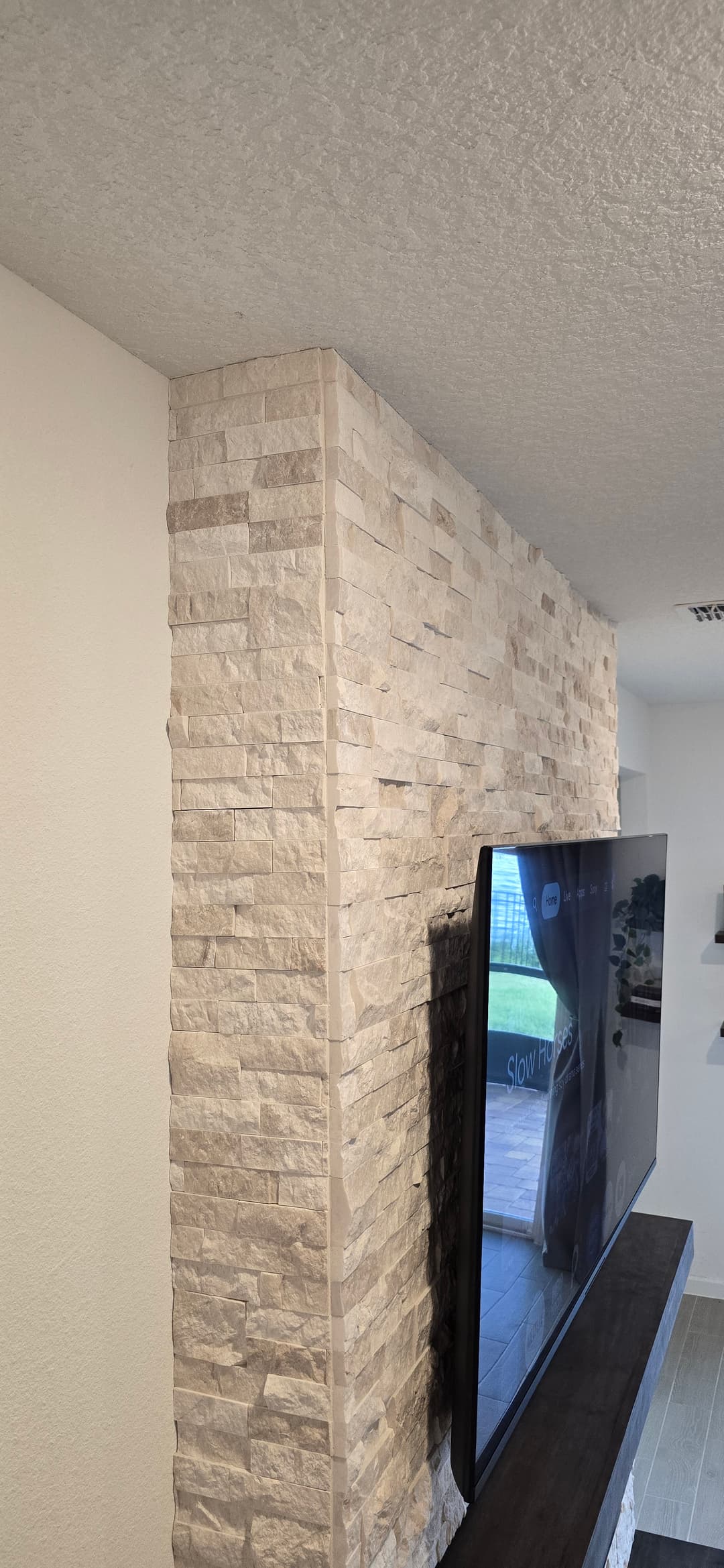 After: TV Entertainment Centers by AVP Construction JAX in Trailmark, St. Johns, FL