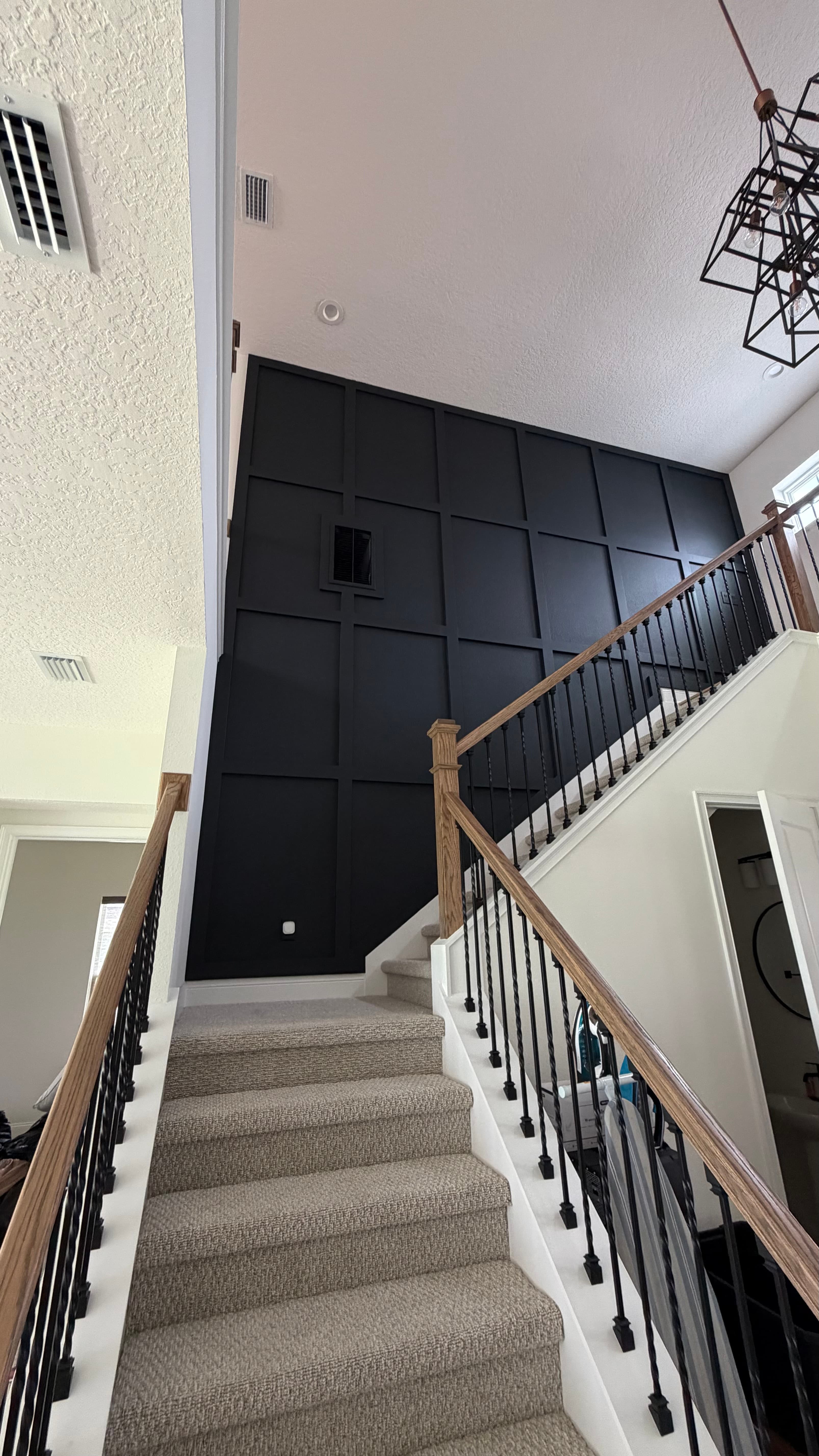 After: Grand staircase accent wall