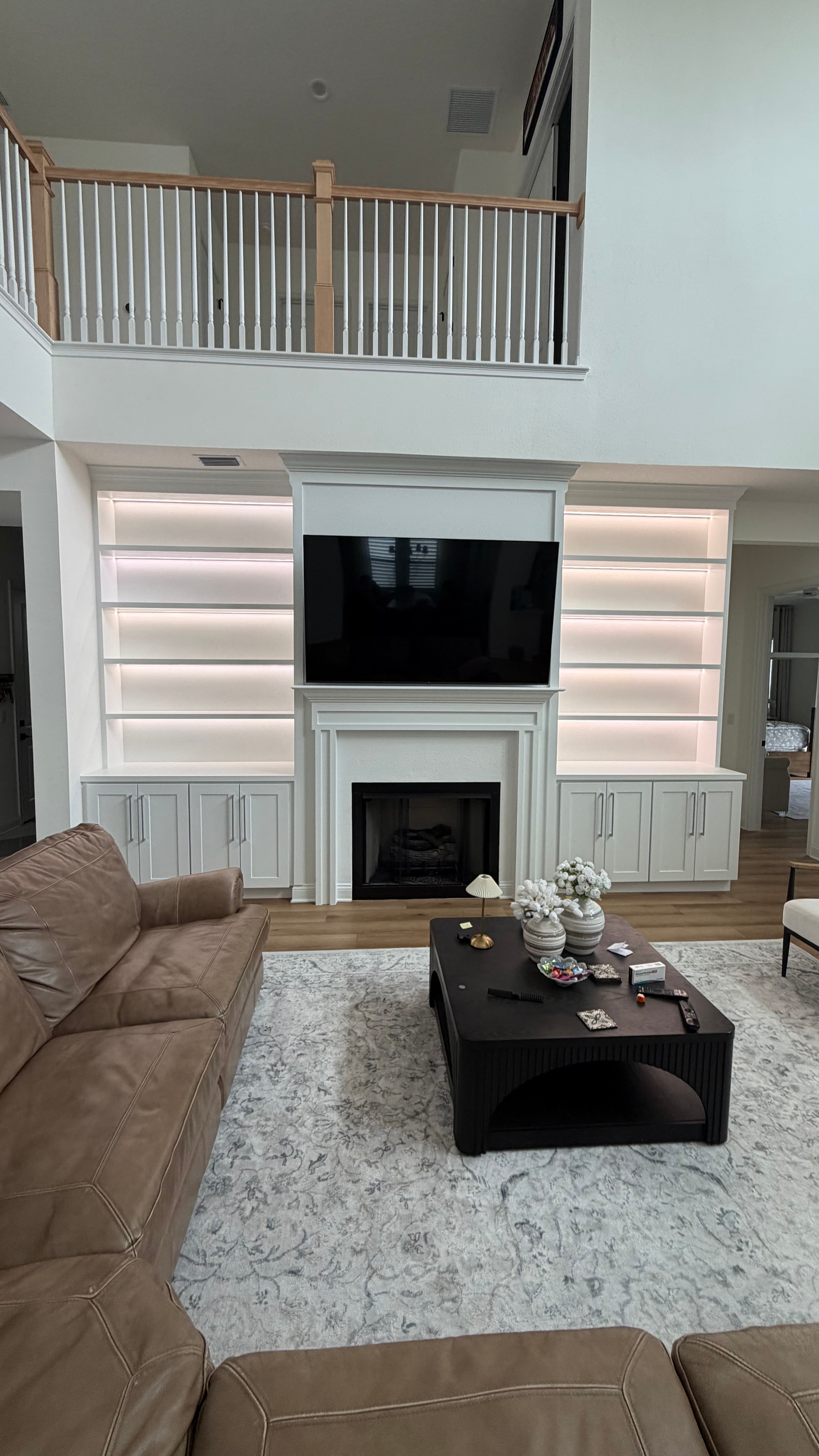 Custom Built-In Entertainment Center with LED Shelving Around Fireplace — Tamaya, Jacksonville FL — Tamaya, Jacksonville, FL