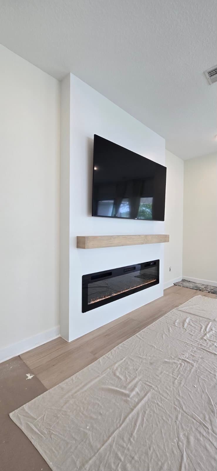 After: TV Entertainment Centers by AVP Construction JAX in ETown, Jacksonville, FL