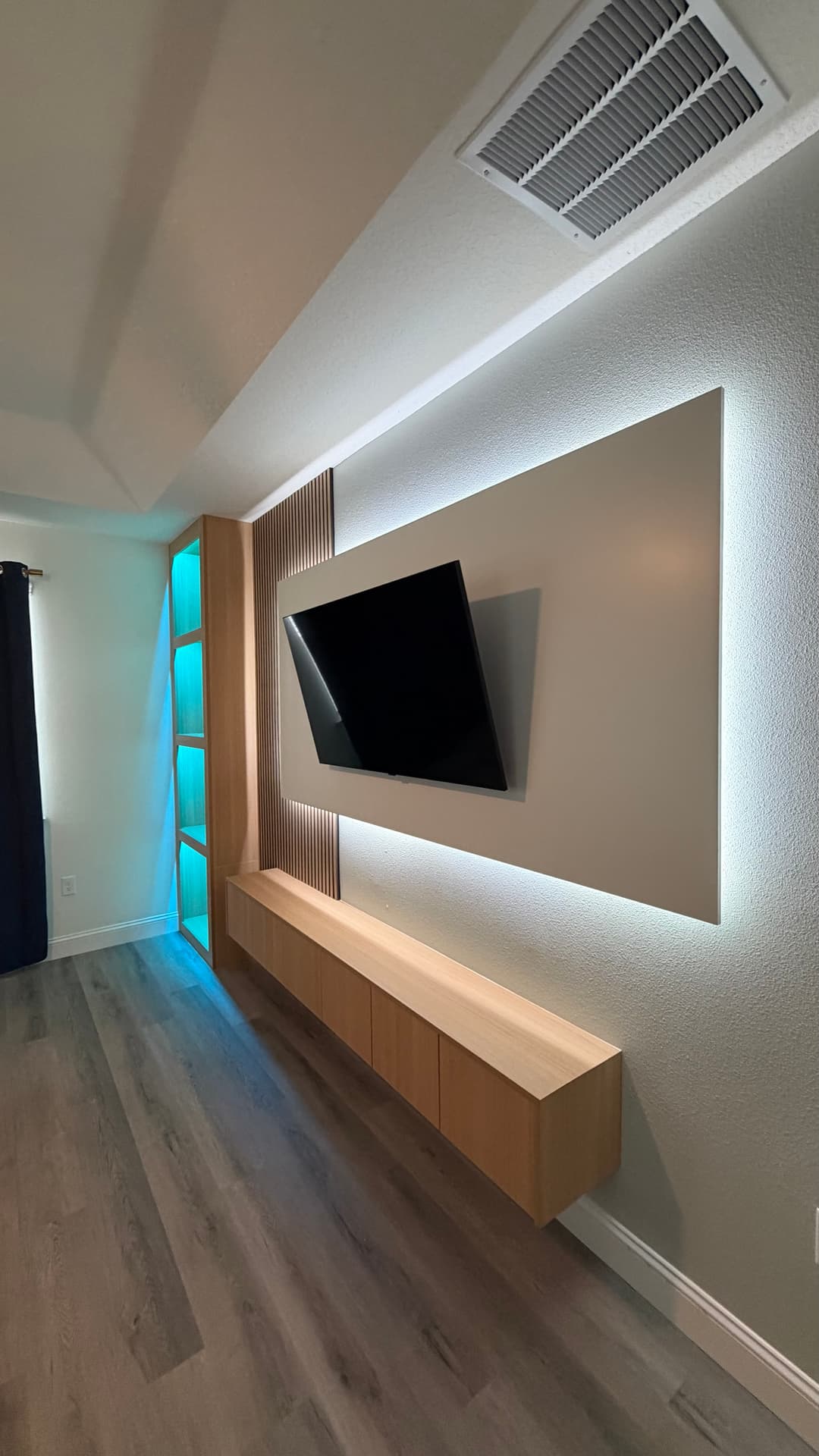 After: TV Entertainment Centers by AVP Construction JAX in Sabal Estates, St. Augustine, FL