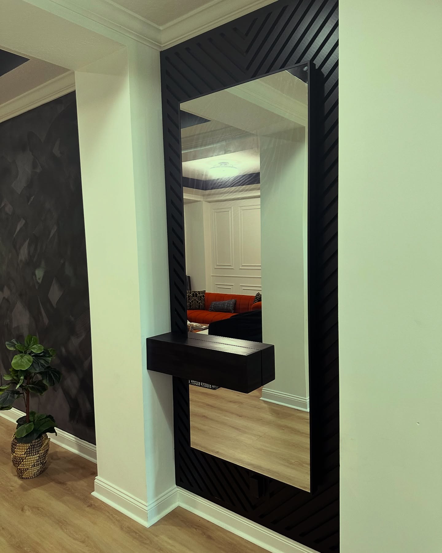 Wainscoting feature wall with chair rail by AVP Construction JAX — Jacksonville & St. John's County, FL
