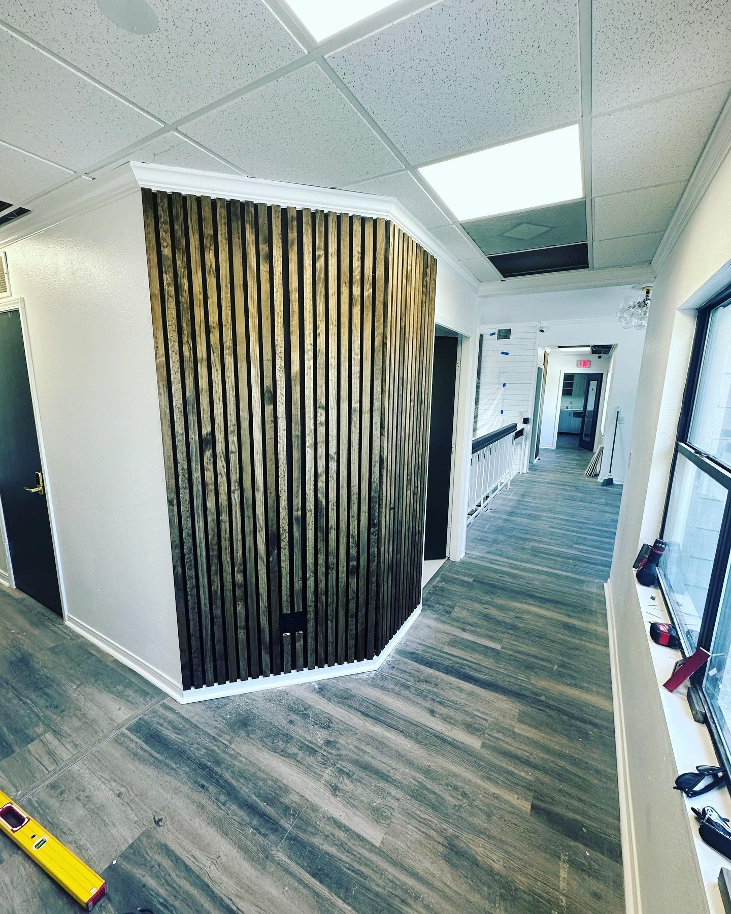 Wainscoting feature wall with chair rail by AVP Construction JAX — Jacksonville & St. John's County, FL