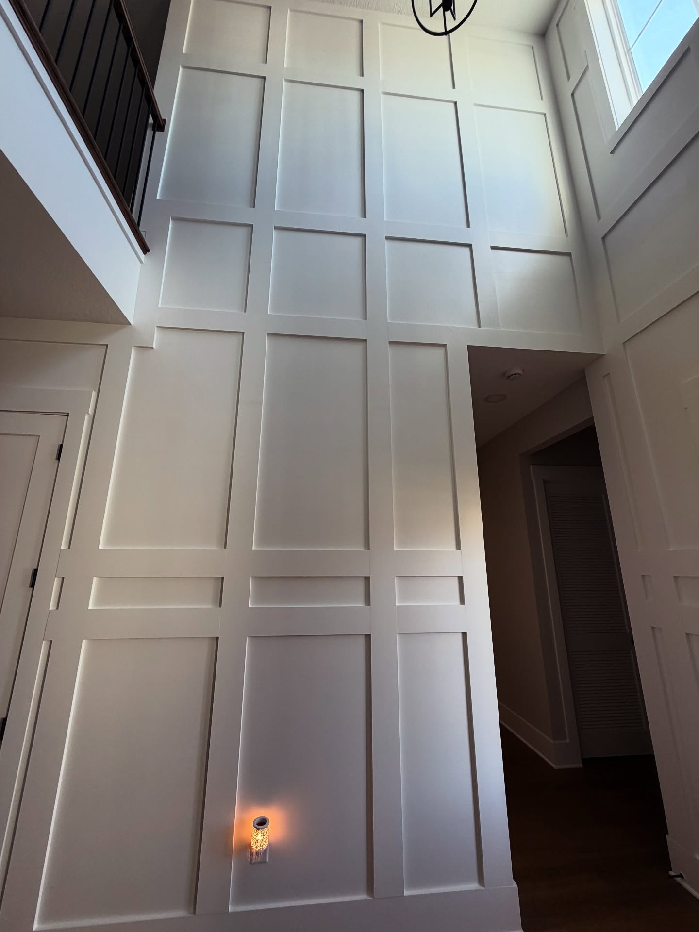 Vertical slat wood accent wall by AVP Construction JAX — Jacksonville & St. John's County, FL