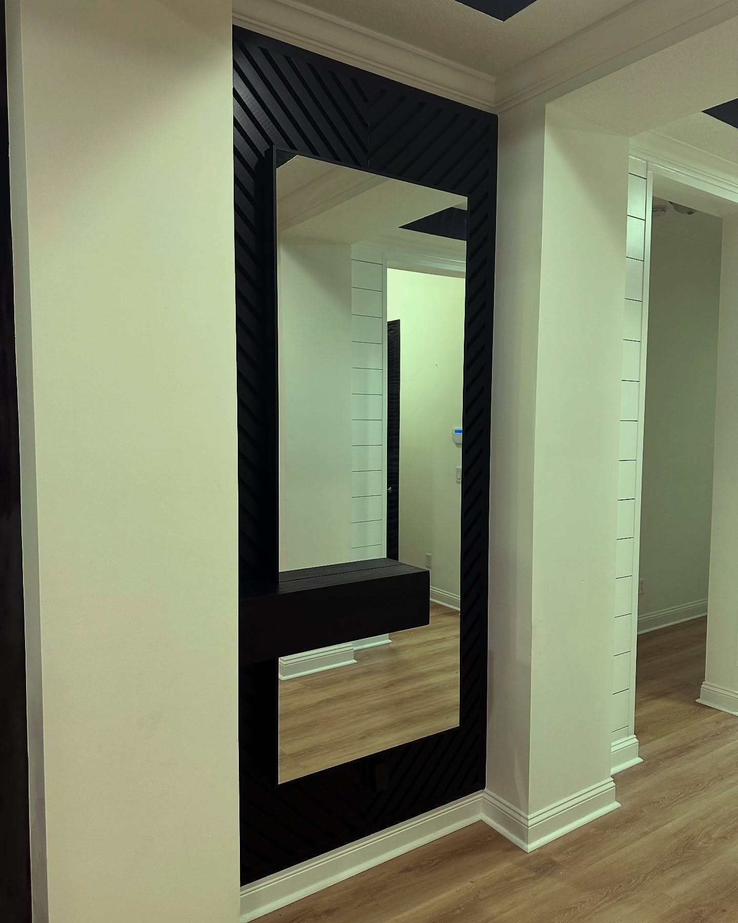 Painted shiplap feature wall by AVP Construction JAX — Jacksonville & St. John's County, FL
