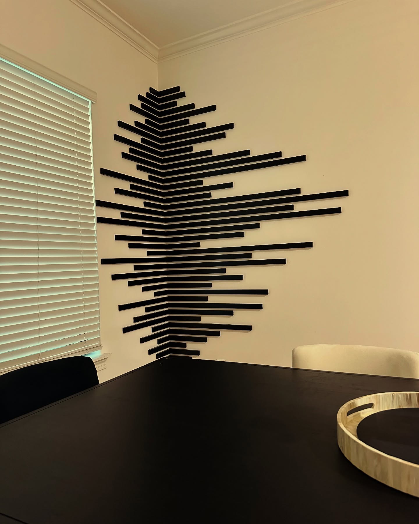 Floor-to-ceiling slat accent wall by AVP Construction JAX — Jacksonville & St. John's County, FL