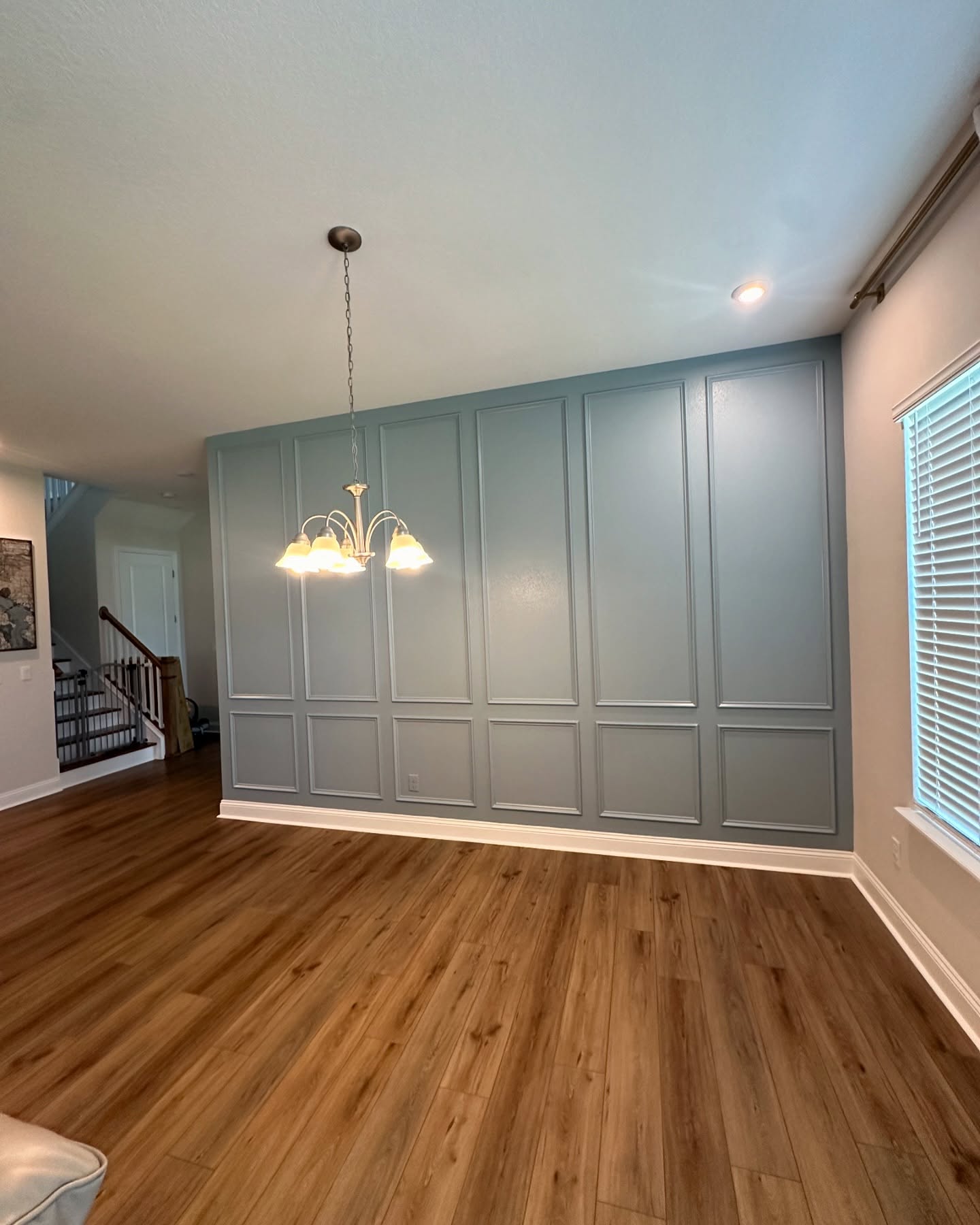 Vertical slat wood accent wall by AVP Construction JAX — Jacksonville & St. John's County, FL