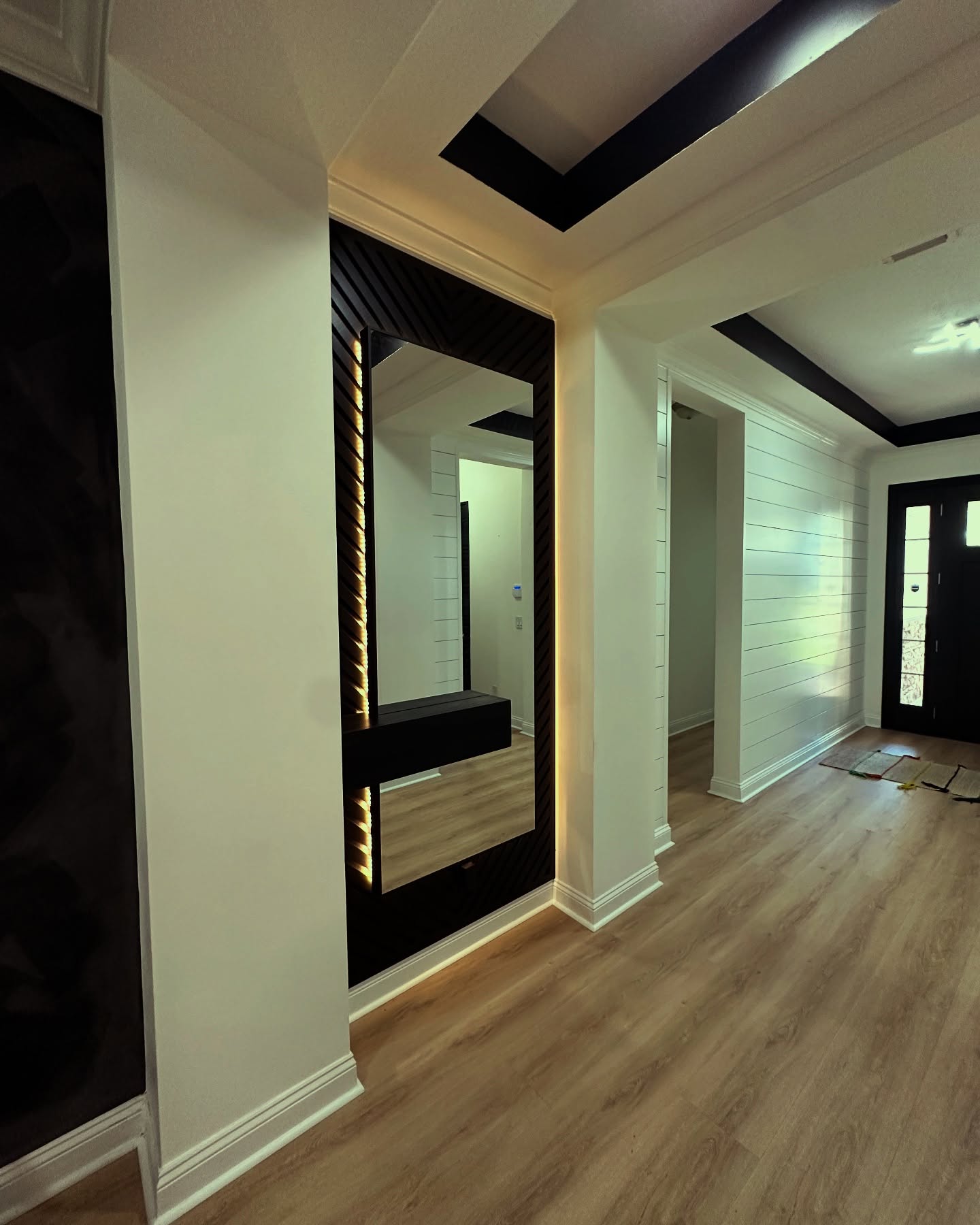 Vertical slat wood accent wall by AVP Construction JAX — Jacksonville & St. John's County, FL