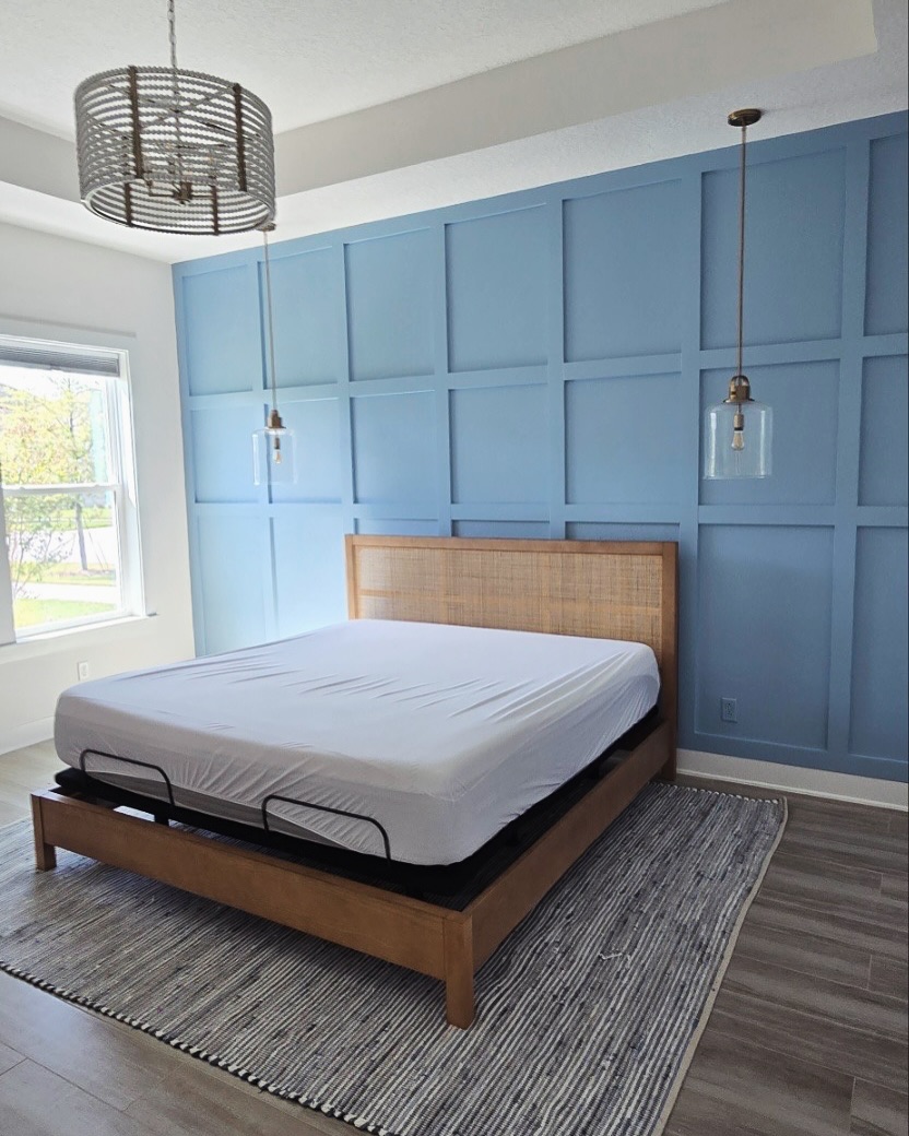 Floor-to-ceiling slat accent wall by AVP Construction JAX — Jacksonville & St. John's County, FL