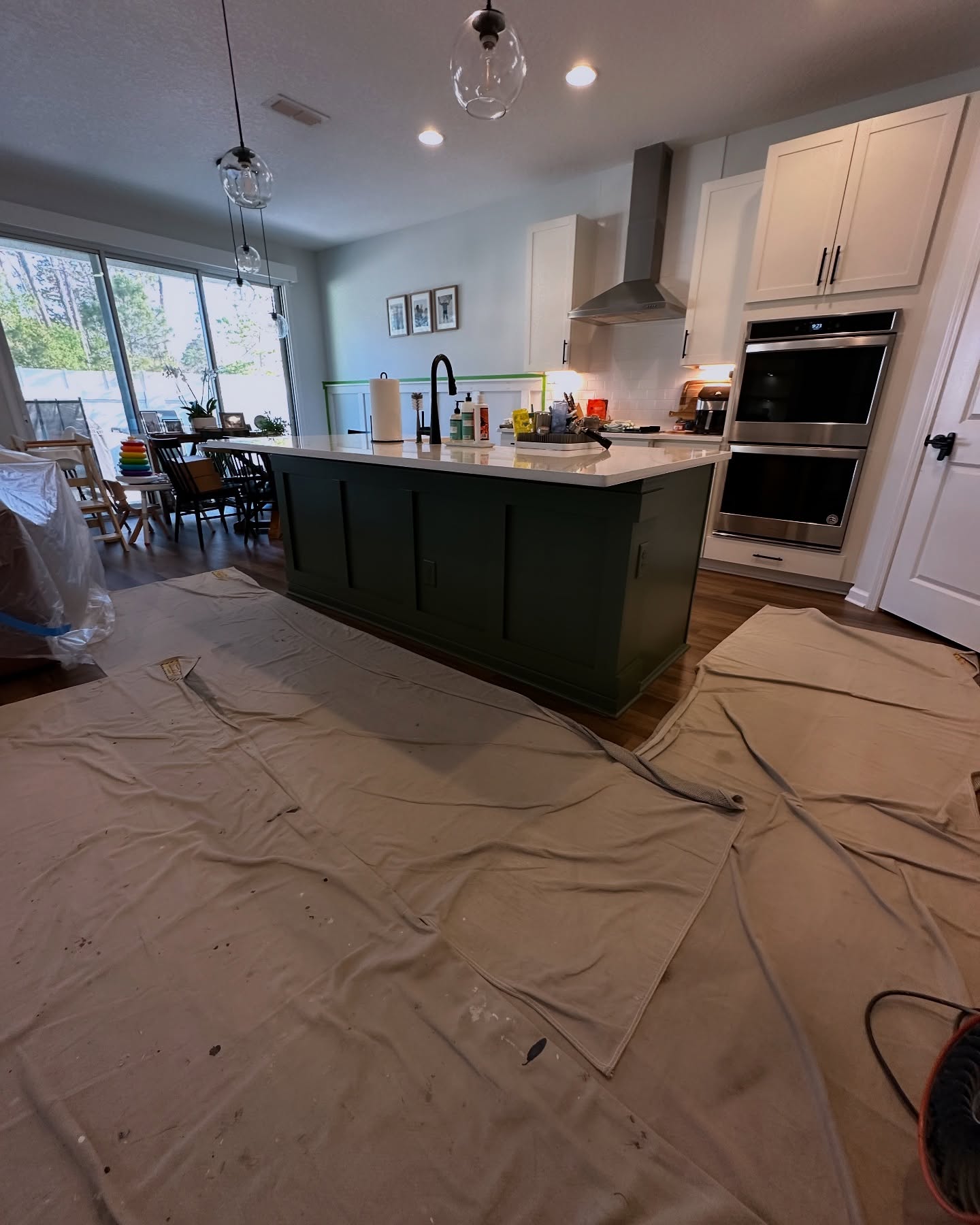 Modern fluted wood accent wall by AVP Construction JAX — Jacksonville & St. John's County, FL