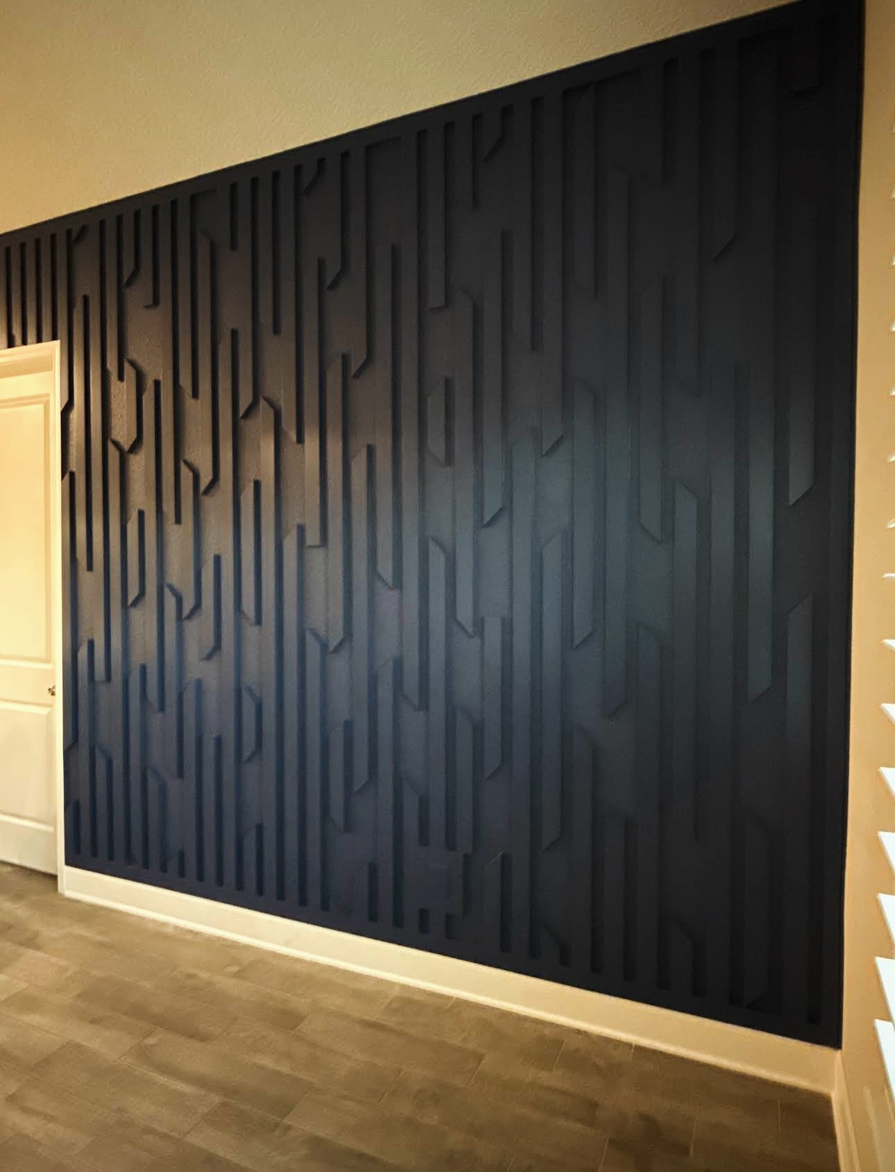 Vertical slat wood accent wall by AVP Construction JAX — Jacksonville & St. John's County, FL