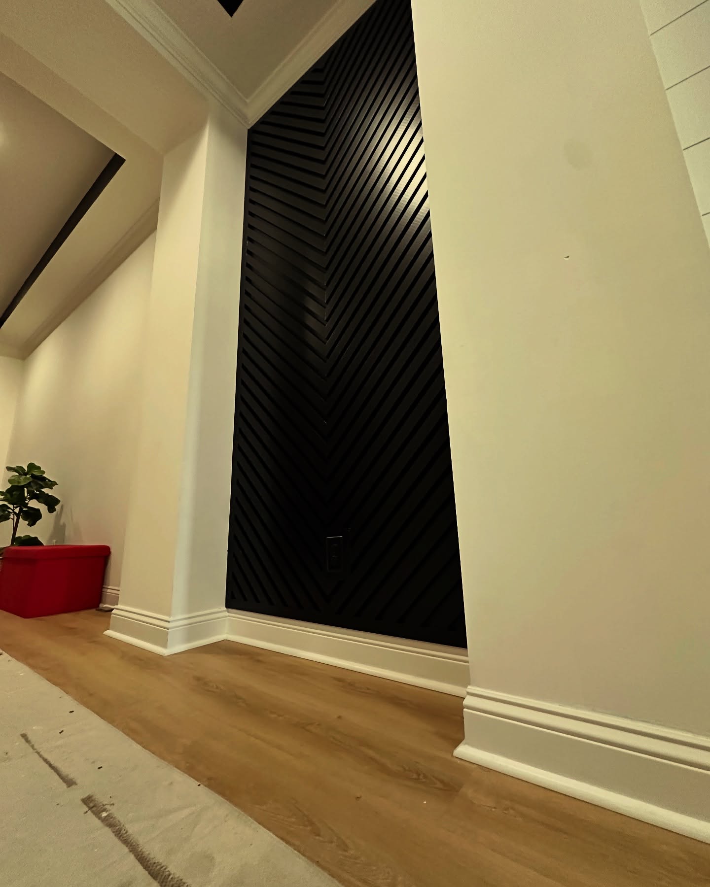 Modern fluted wood accent wall by AVP Construction JAX — Jacksonville & St. John's County, FL