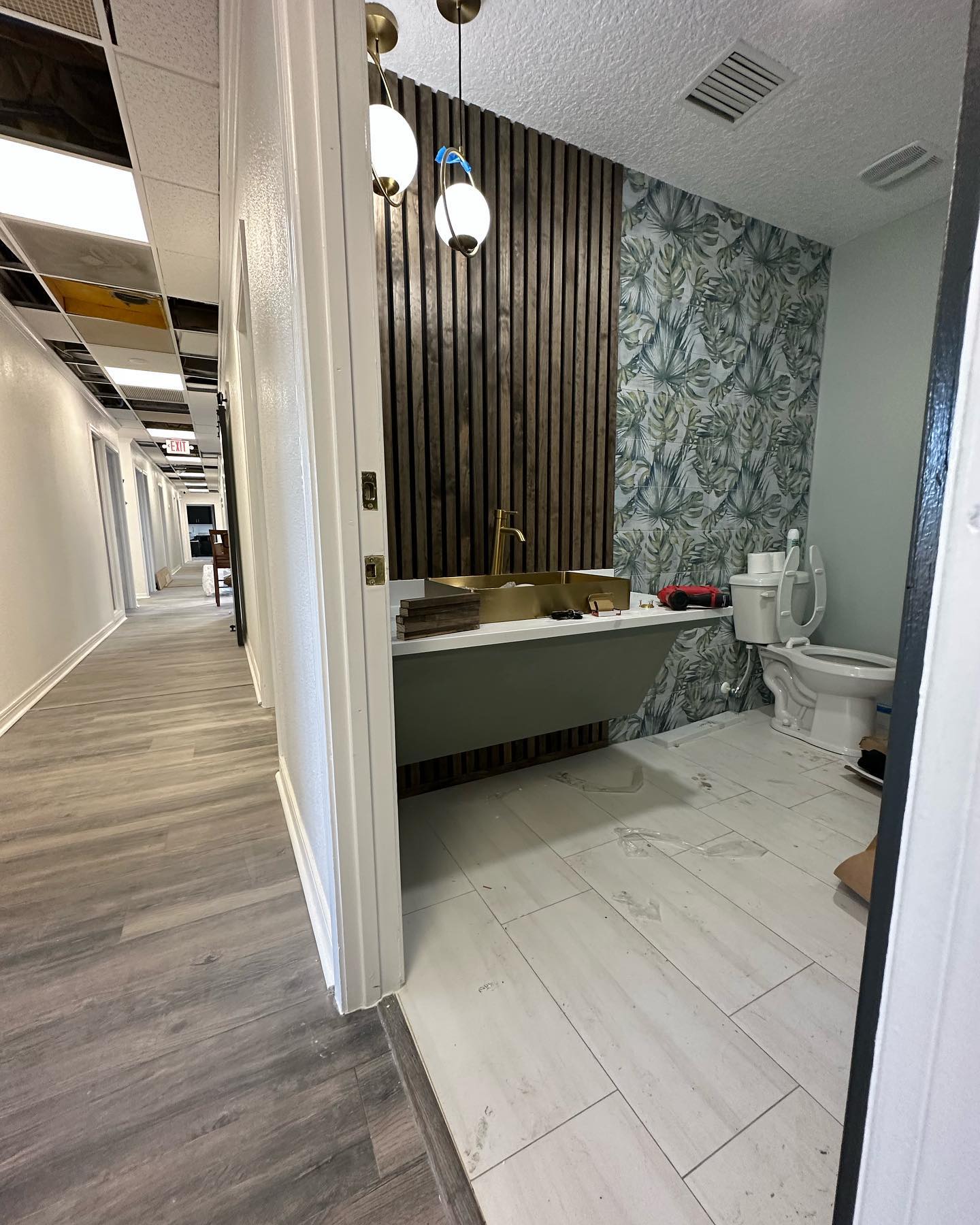 Painted shiplap feature wall by AVP Construction JAX — Jacksonville & St. John's County, FL