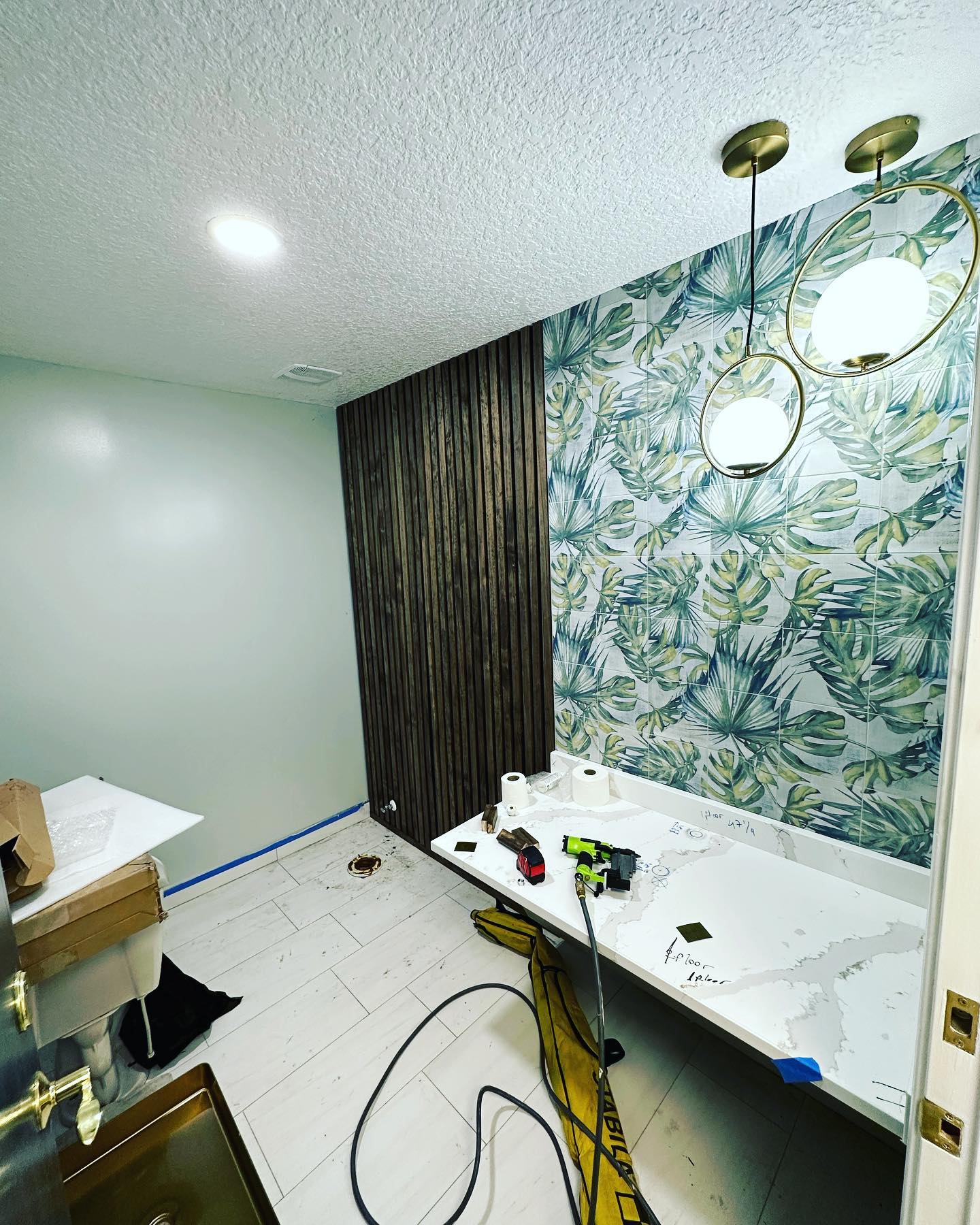 Wainscoting feature wall with chair rail by AVP Construction JAX — Jacksonville & St. John's County, FL