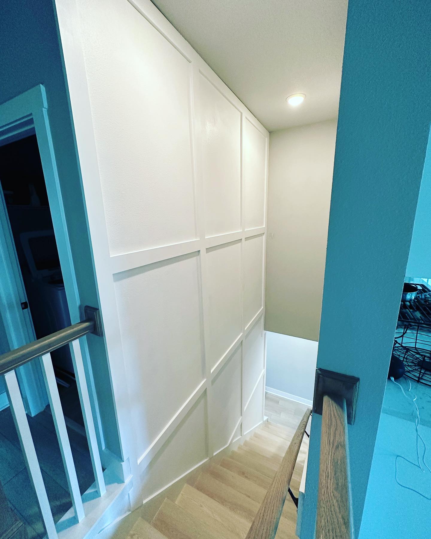 Statement bedroom accent wall in white shiplap by AVP Construction JAX — Jacksonville & St. John's County, FL