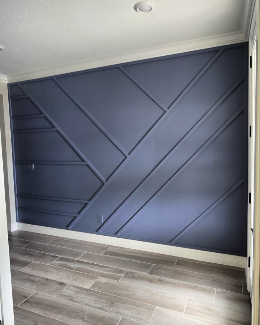 Board and batten accent wall by AVP Construction JAX — Jacksonville & St. John's County, FL