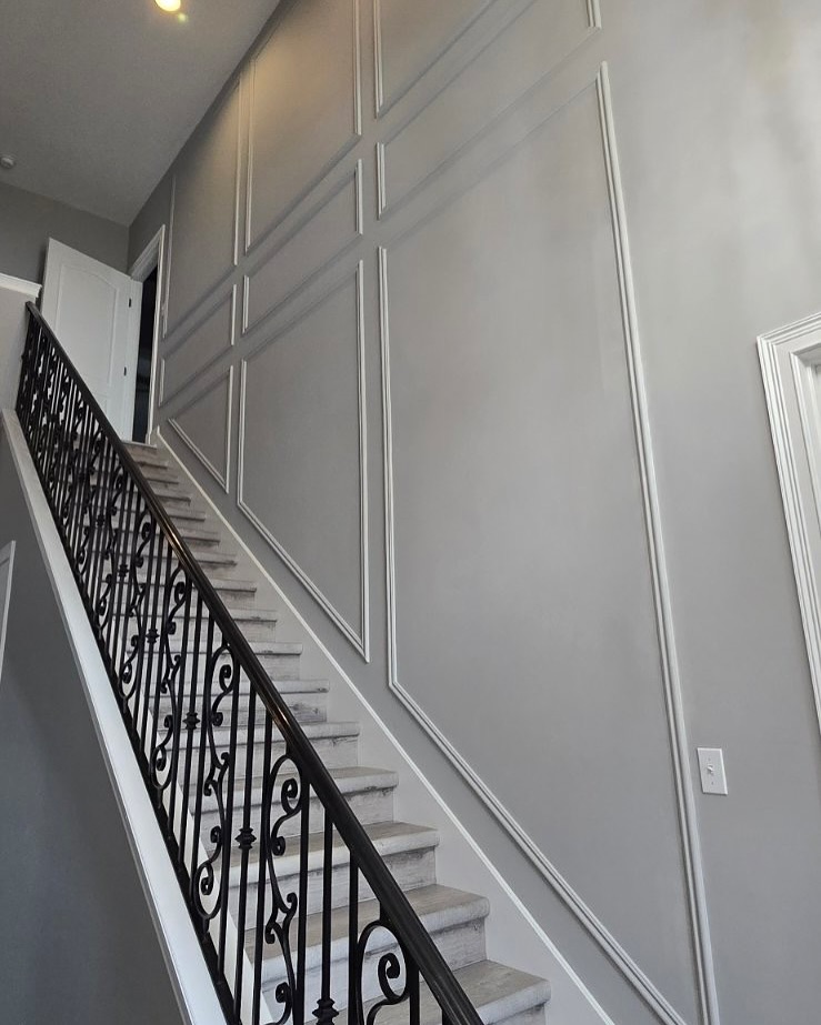 Vertical slat wood accent wall by AVP Construction JAX — Jacksonville & St. John's County, FL