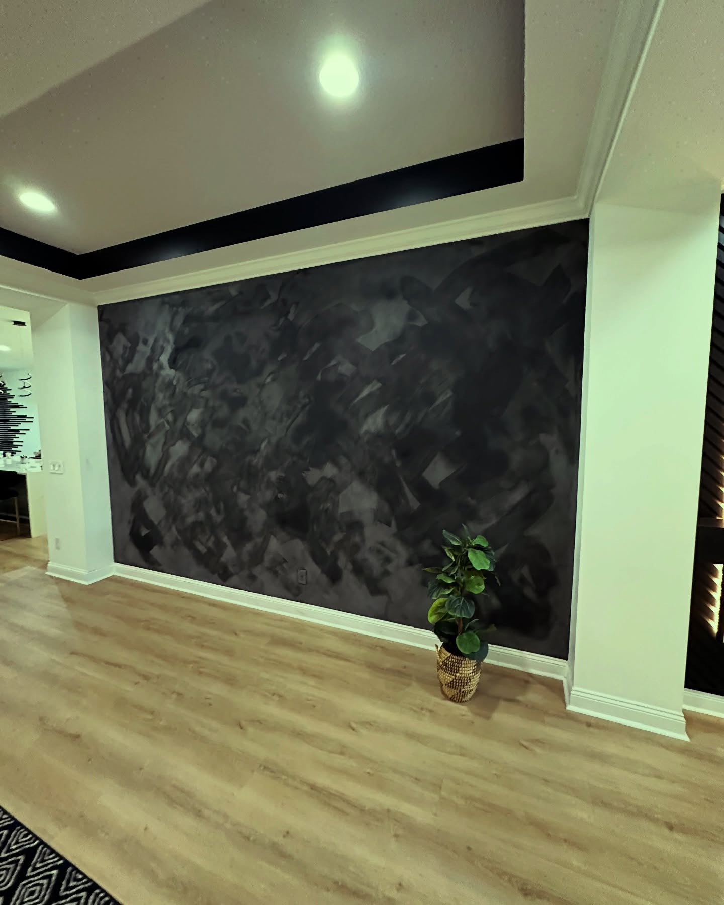 Modern fluted wood accent wall by AVP Construction JAX — Jacksonville & St. John's County, FL