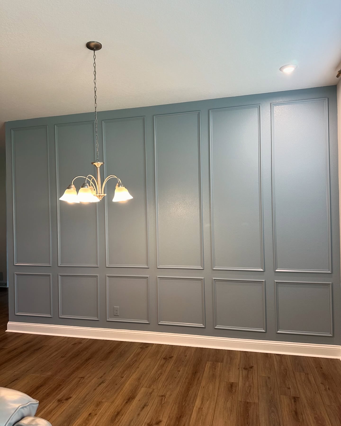 Modern fluted wood accent wall by AVP Construction JAX — Jacksonville & St. John's County, FL