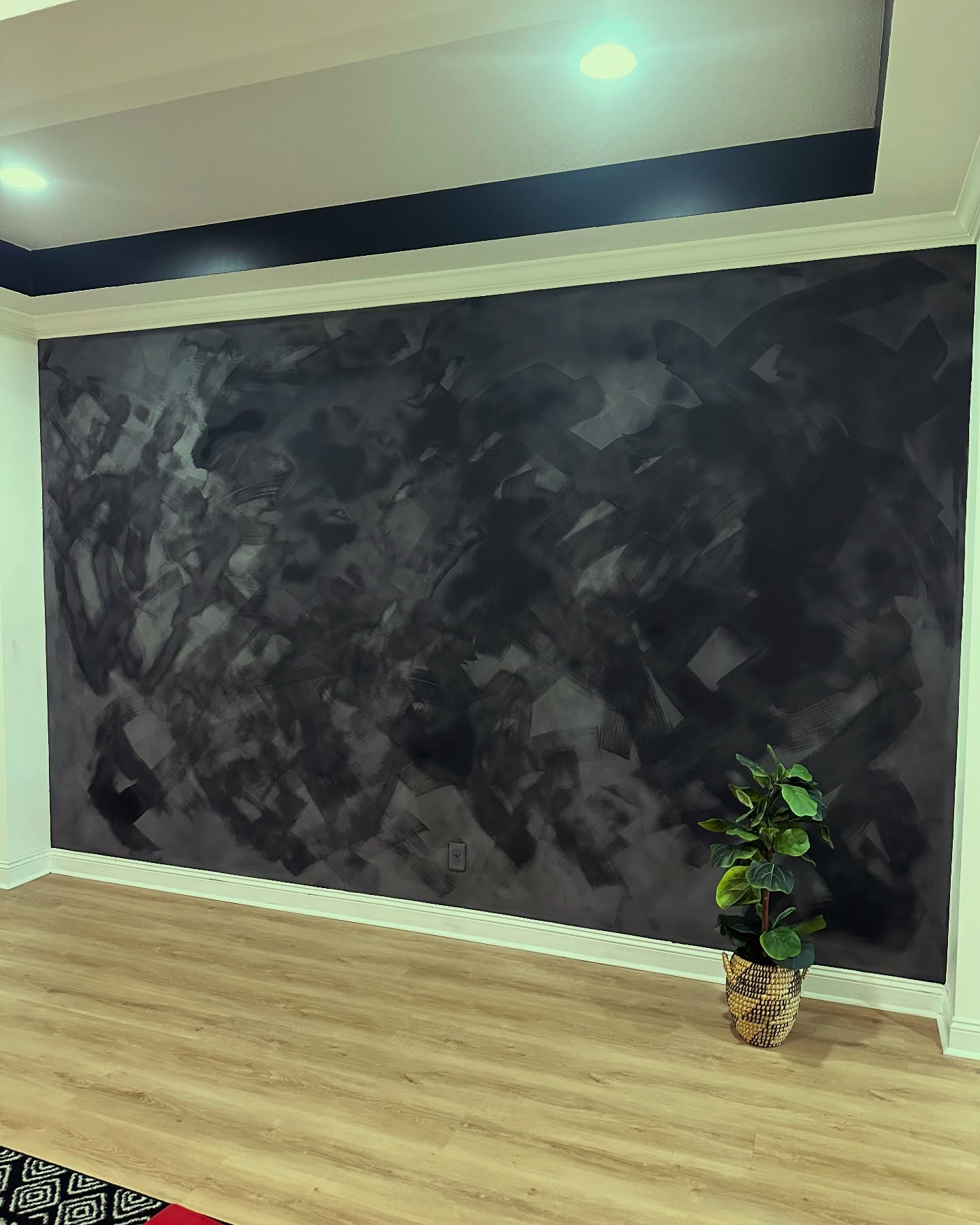 Floor-to-ceiling slat accent wall by AVP Construction JAX — Jacksonville & St. John's County, FL