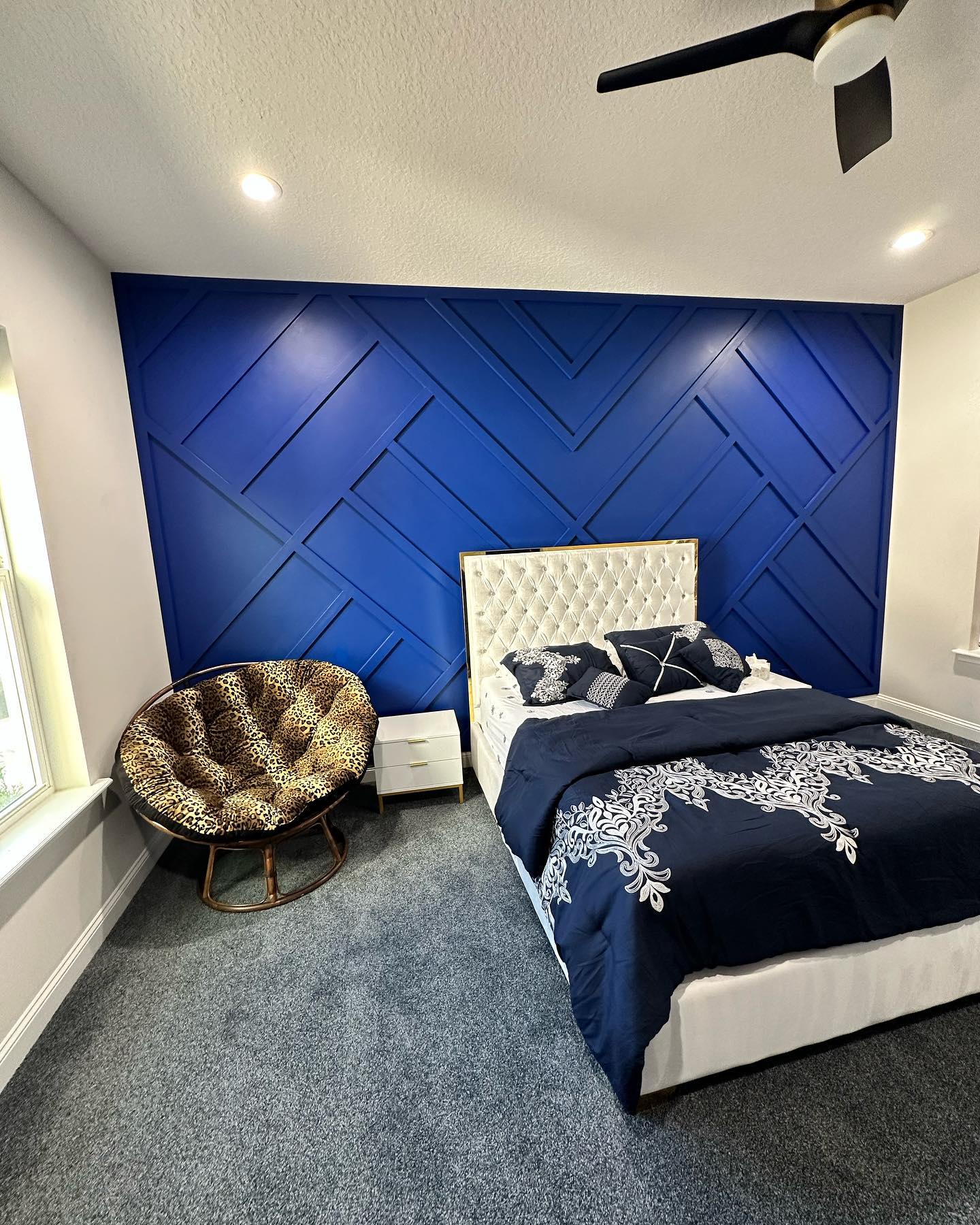 Modern fluted wood accent wall by AVP Construction JAX — Jacksonville & St. John's County, FL