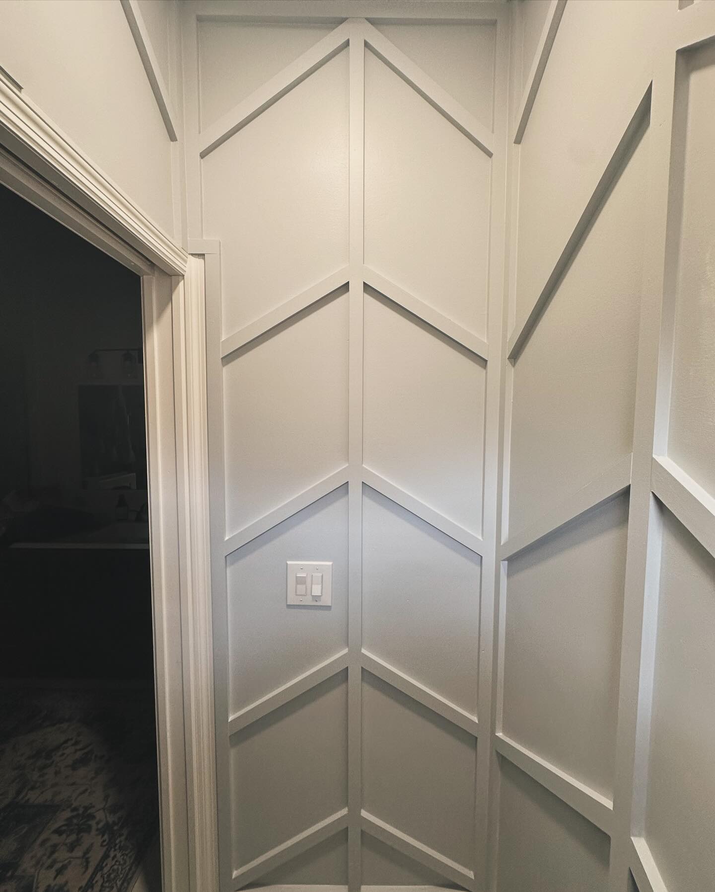 Statement bedroom accent wall in white shiplap by AVP Construction JAX — Jacksonville & St. John's County, FL