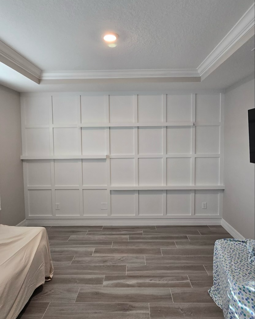 Vertical slat wood accent wall by AVP Construction JAX — Jacksonville & St. John's County, FL