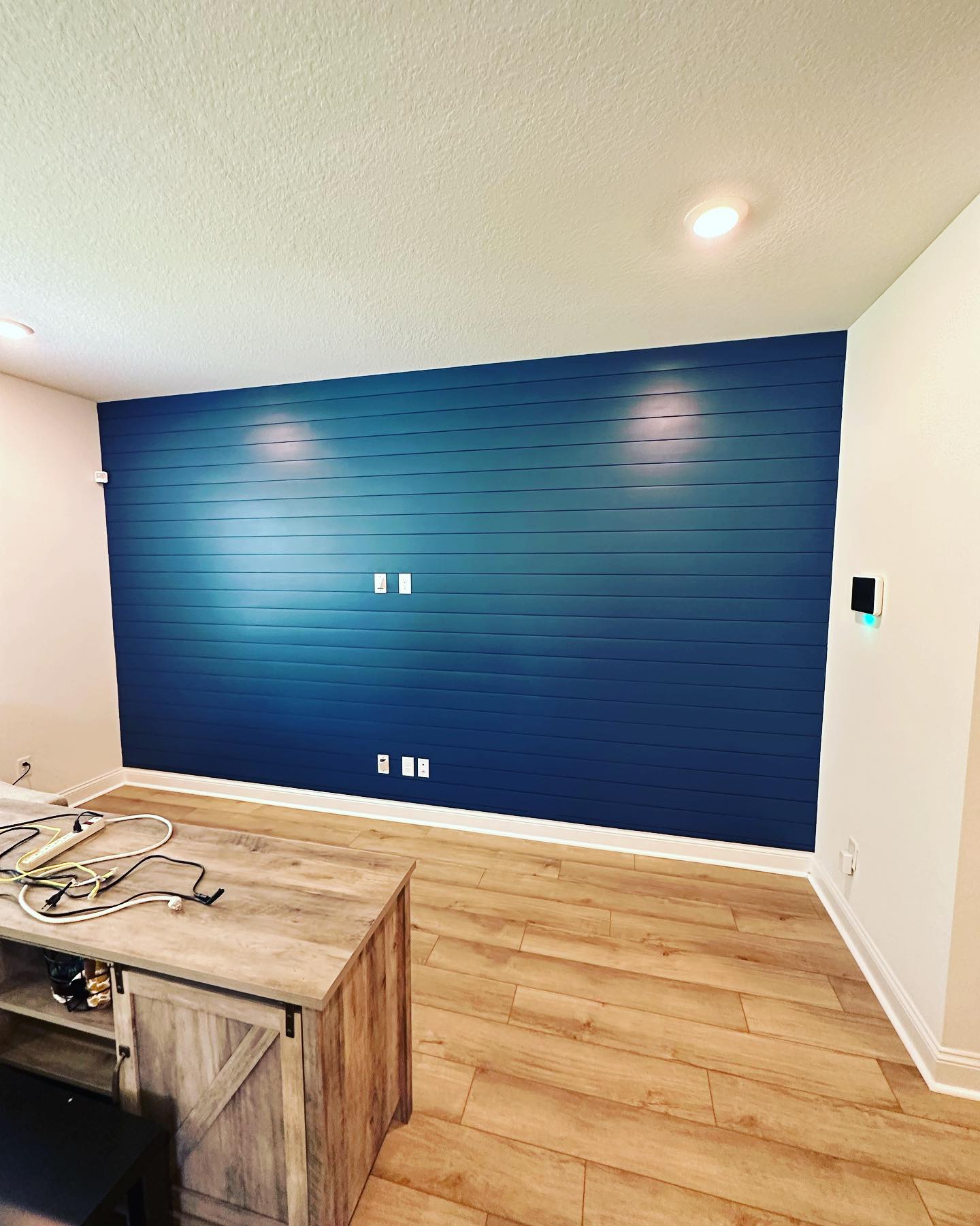 Board and batten accent wall by AVP Construction JAX — Jacksonville & St. John's County, FL