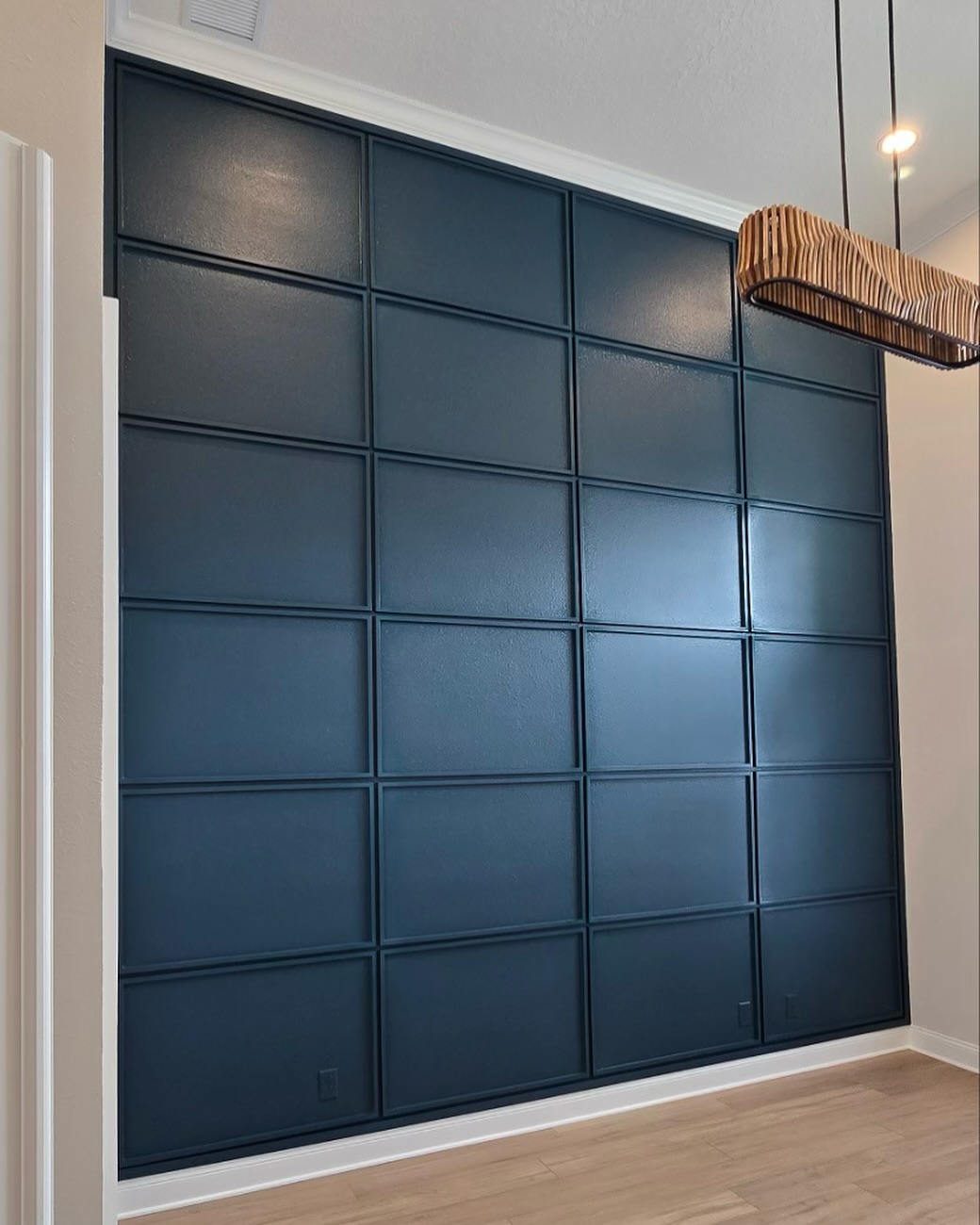 Painted shiplap feature wall by AVP Construction JAX — Jacksonville & St. John's County, FL
