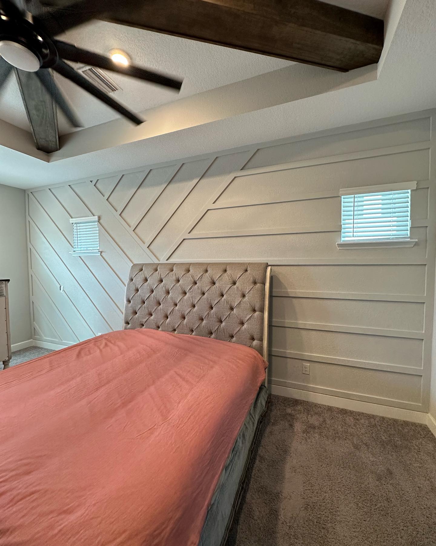 Statement bedroom accent wall in white shiplap by AVP Construction JAX — Jacksonville & St. John's County, FL