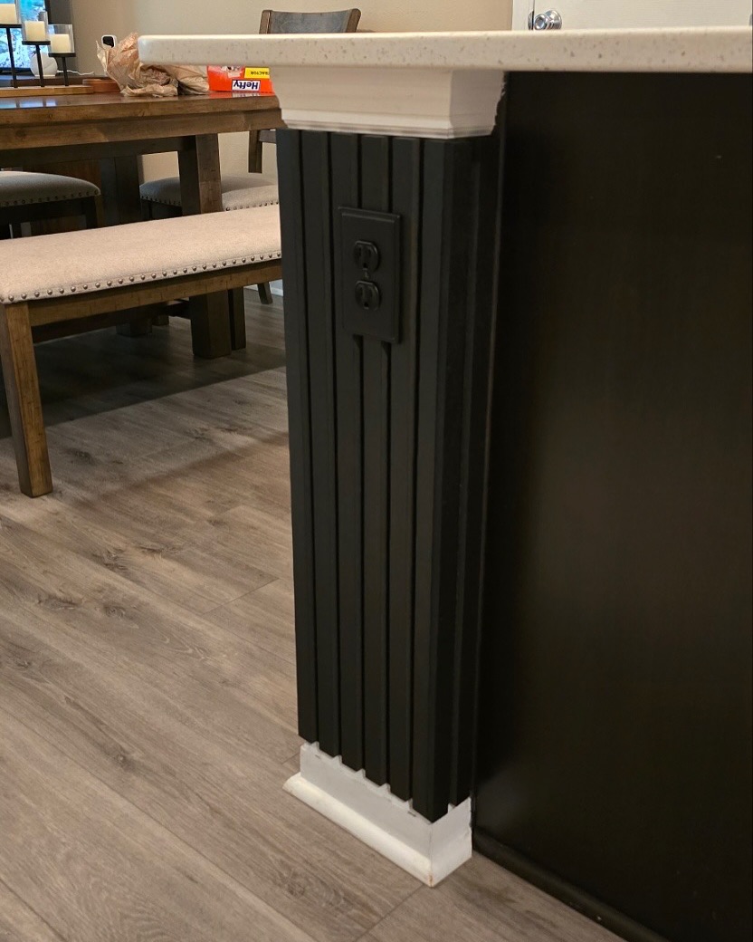 Vertical slat wood accent wall by AVP Construction JAX — Jacksonville & St. John's County, FL