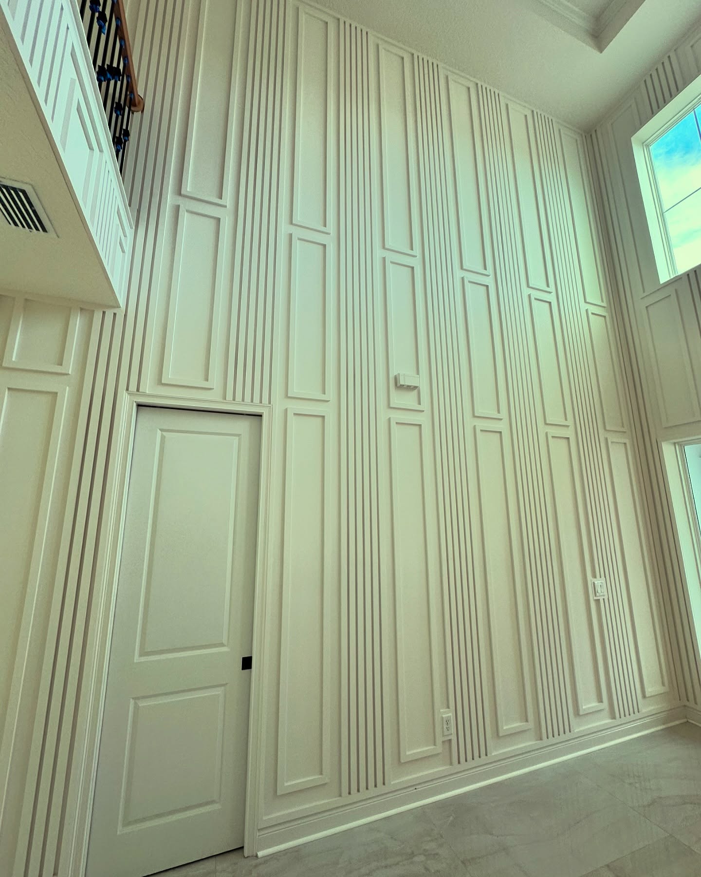 Board and batten accent wall by AVP Construction JAX — Jacksonville & St. John's County, FL