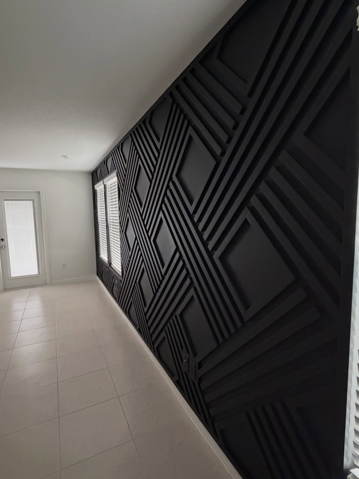 Painted shiplap feature wall by AVP Construction JAX — Jacksonville & St. John's County, FL
